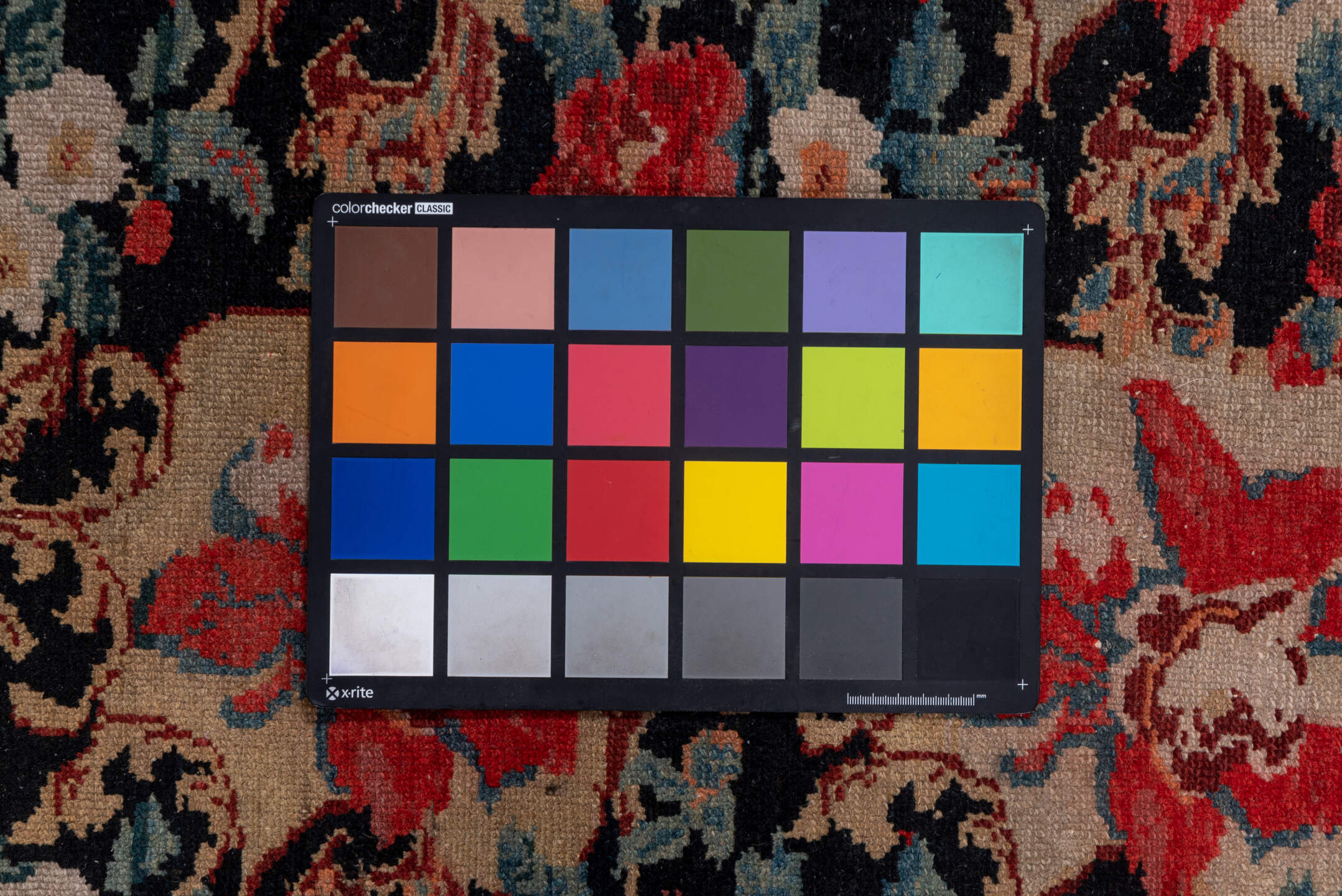 4' x 5' one-of-a-kind handmade vintage Malayer small size rug. Color palette: black, brown, gray, pink, red