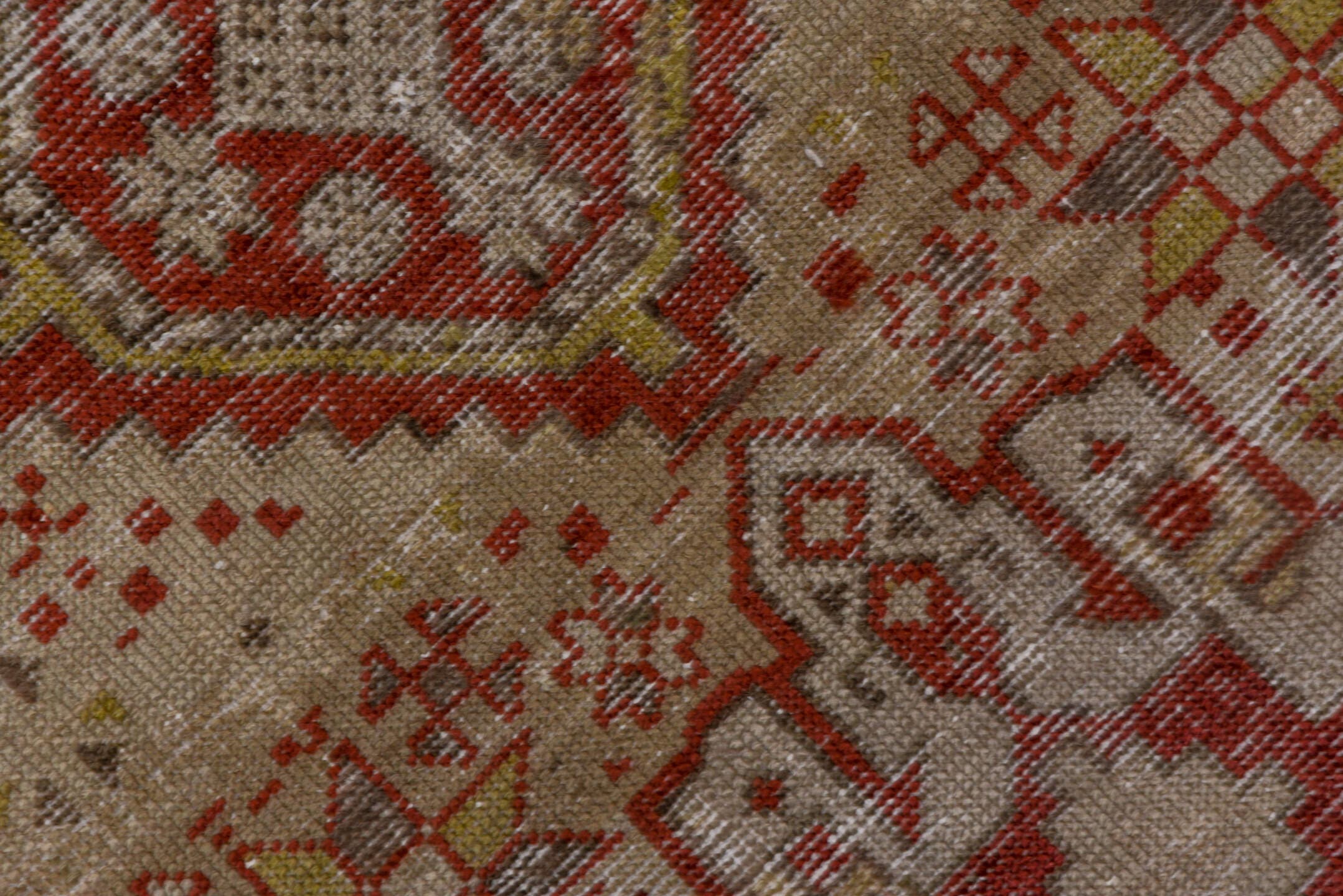 3' x 12' one-of-a-kind handmade antique Karaje runner rug. Color palette: ivory, rust, brick, taupe, camel, brown, rose