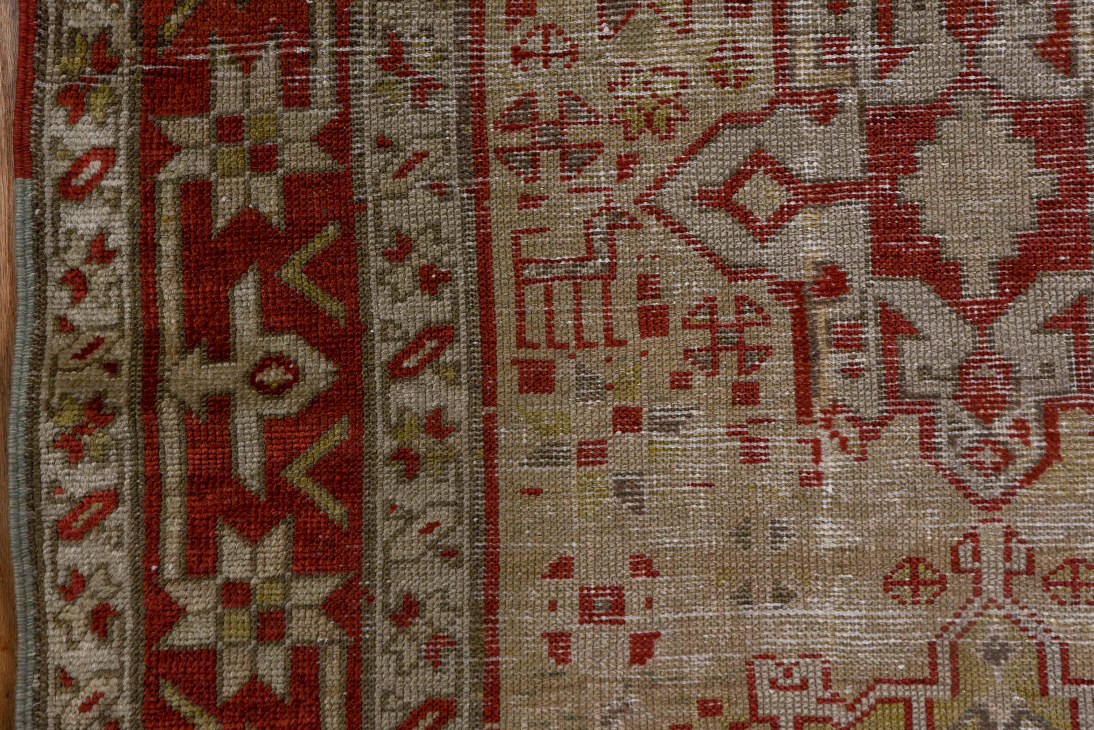3' x 12' one-of-a-kind handmade antique Karaje runner rug. Color palette: ivory, rust, brick, taupe, camel, brown, rose