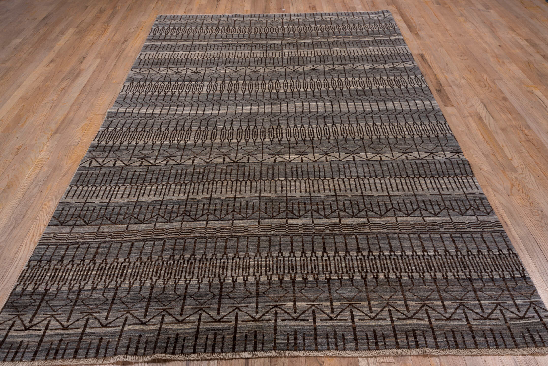 6' x 9' one-of-a-kind handmade vintage Gabbe medium size rug. Color palette: taupe, charcoal, ivory, brown, gray, beige