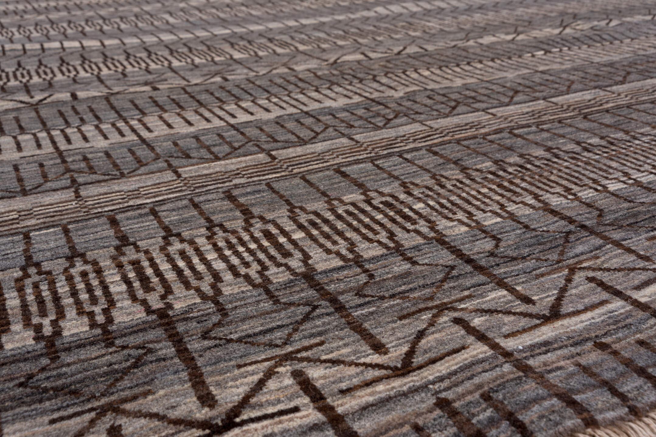 6' x 9' one-of-a-kind handmade vintage Gabbe medium size rug. Color palette: taupe, charcoal, ivory, brown, gray, beige