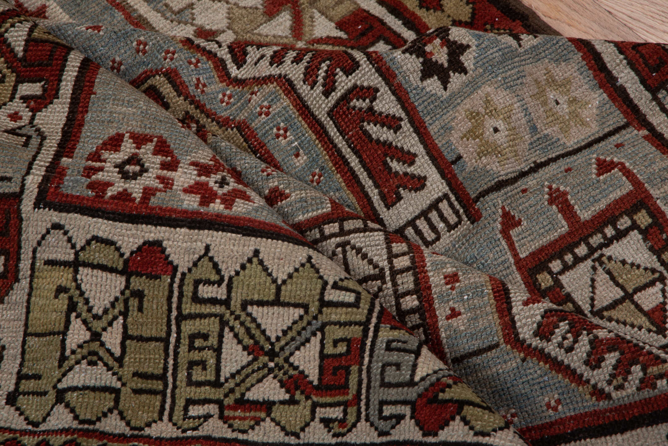 4' x 7' one-of-a-kind handmade vintage Kazak rug. Color palette: black, brown, dim gray, gray, red