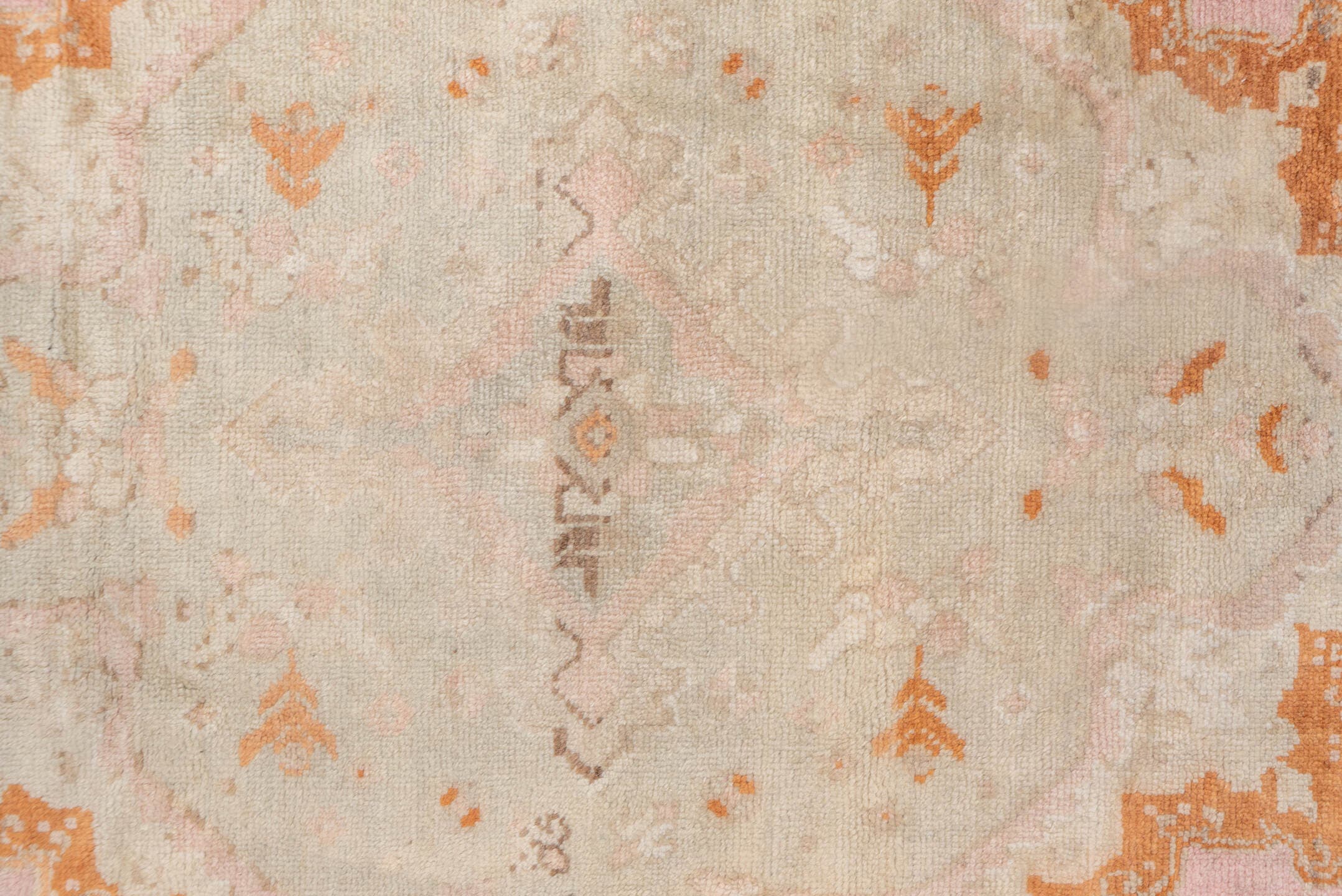 10' x 21' one-of-a-kind handmade antique Oushak rug. Color palette: ivory, blush, peach, taupe, camel, sage, pink