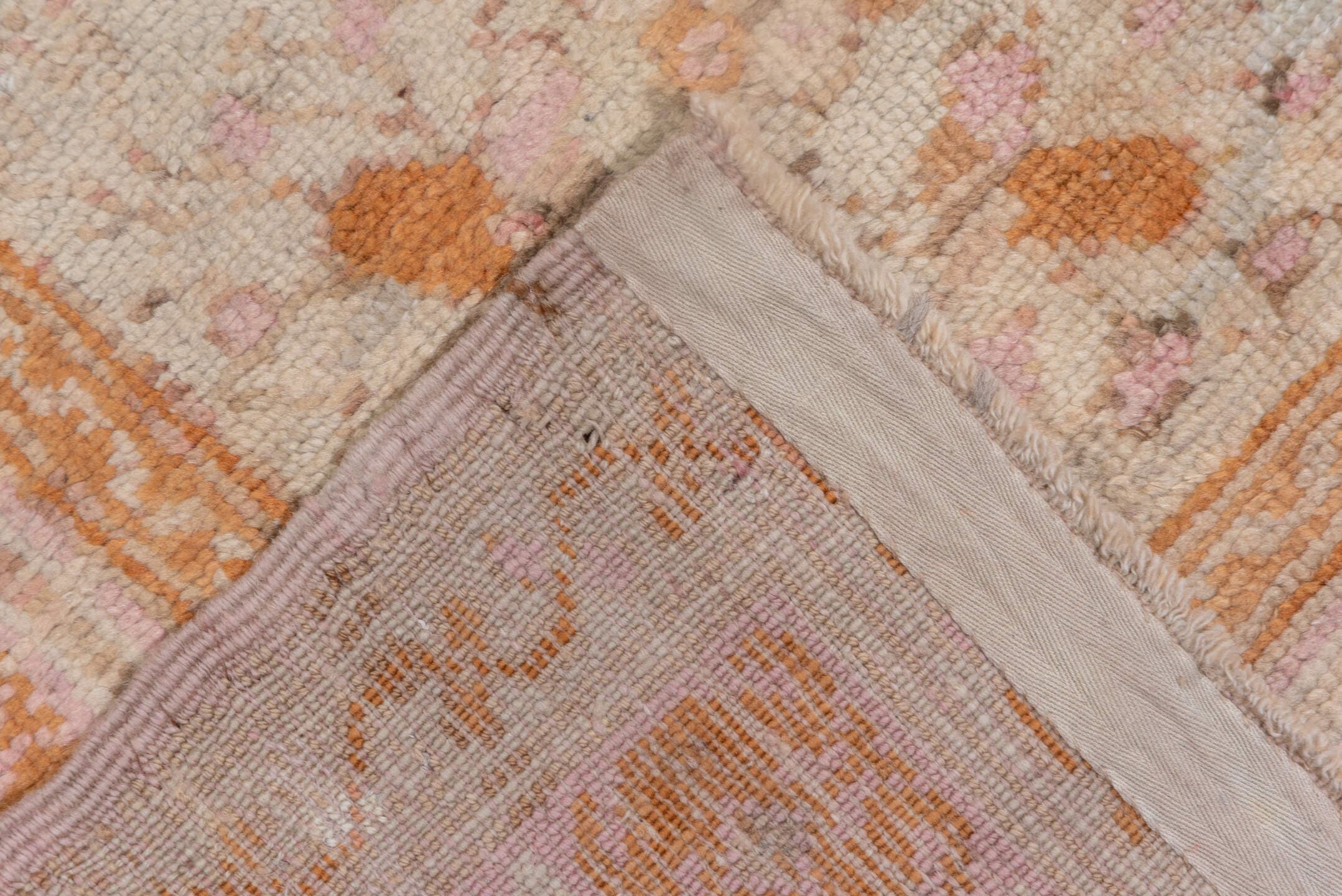 10' x 21' one-of-a-kind handmade antique Oushak rug. Color palette: ivory, blush, peach, taupe, camel, sage, pink