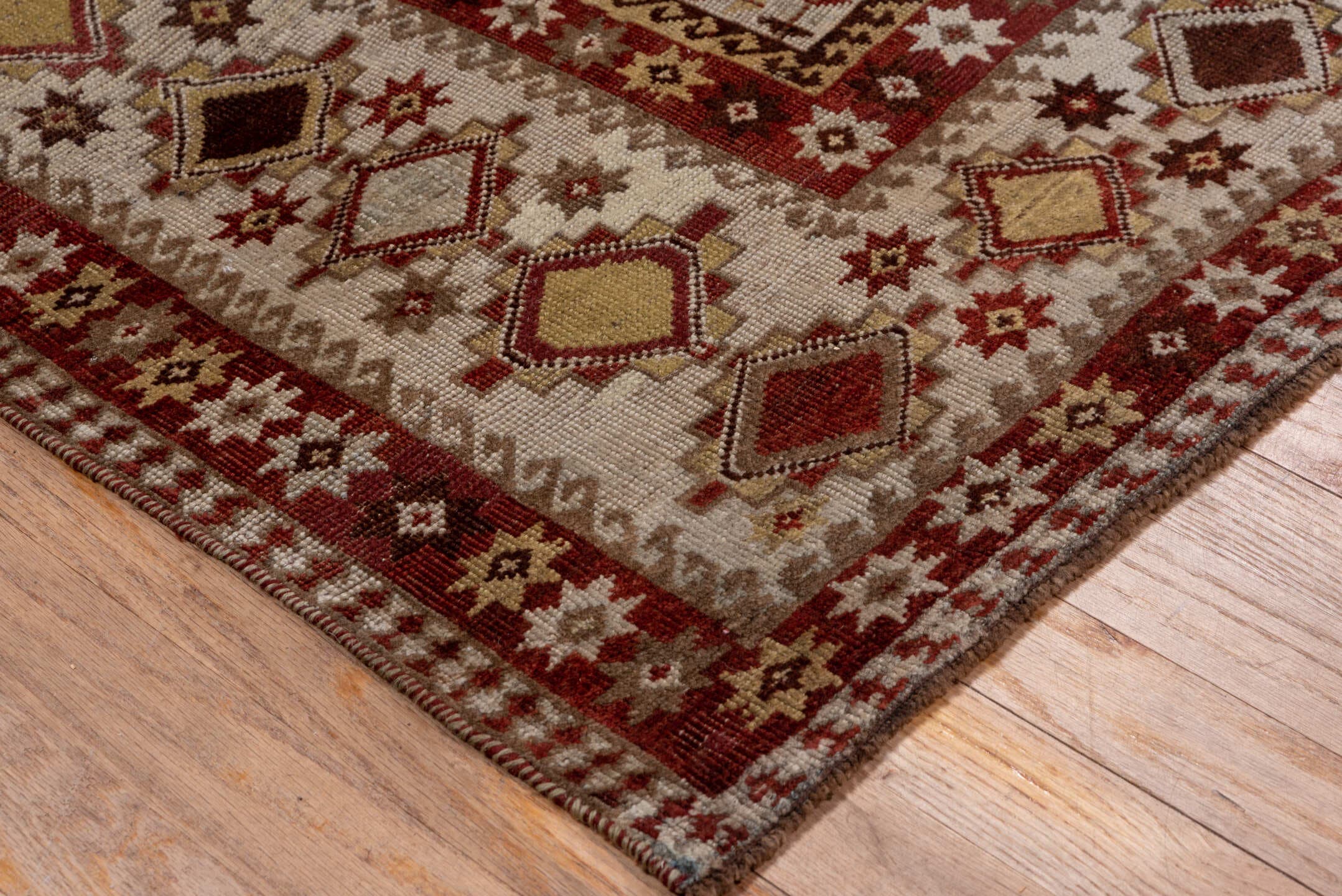 7' x 10' one-of-a-kind handmade antique Shiraz large size rug. Color palette: rust, ivory, taupe, brown, terracotta, camel