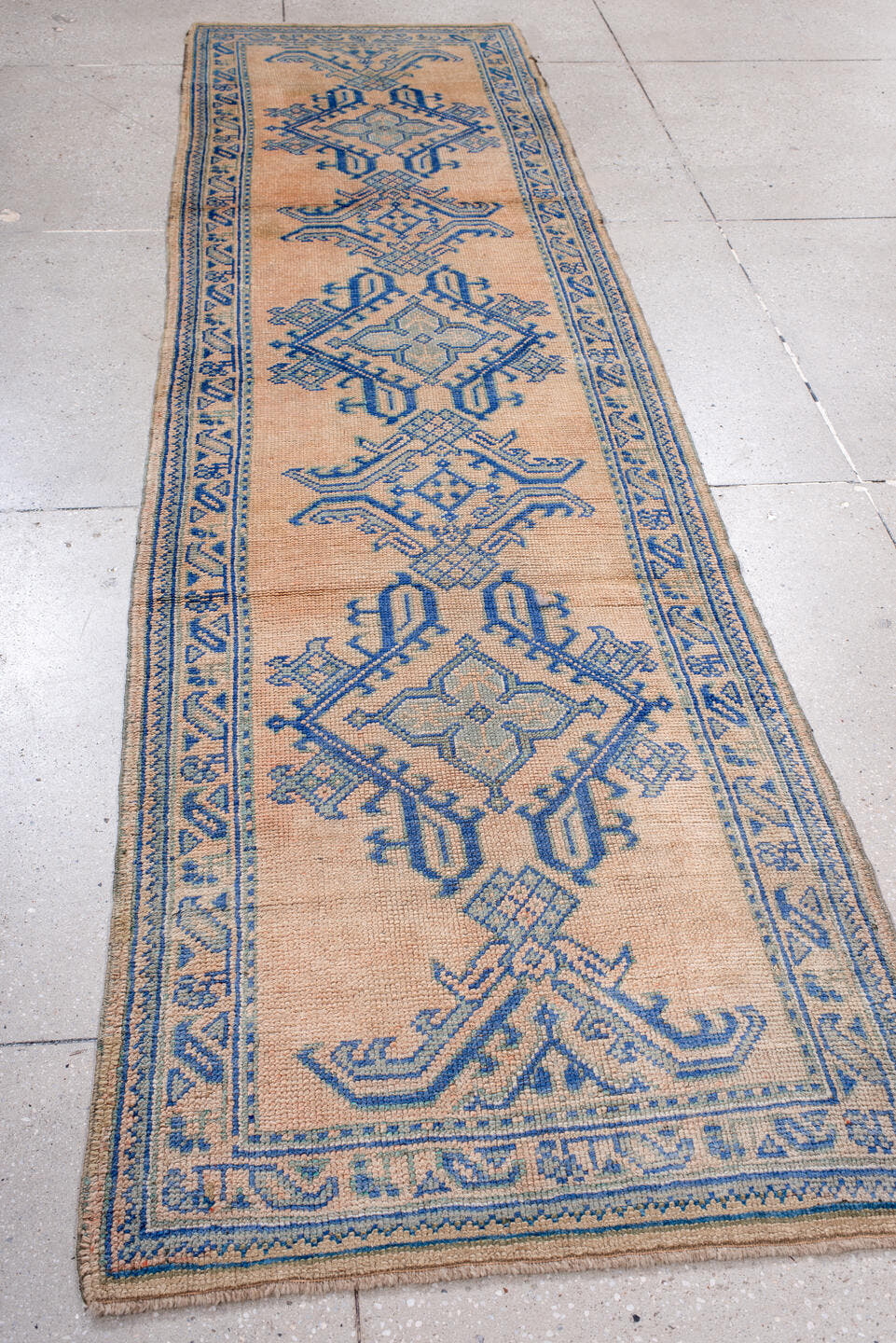 3' x 11' one-of-a-kind handmade antique Oushak runner rug. Color palette: peach, sky blue, ivory, beige, camel, terracotta
