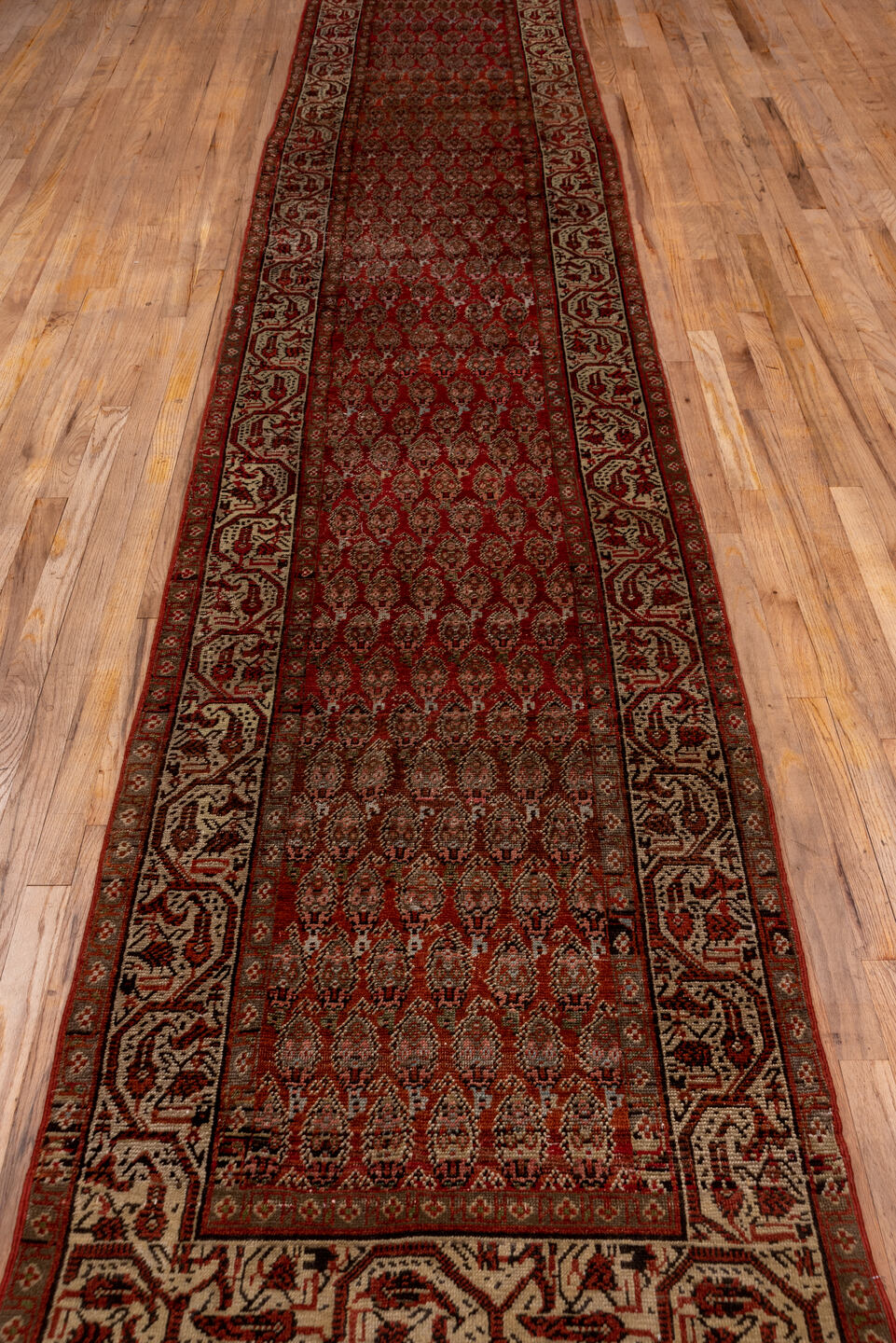 3' x 19' one-of-a-kind handmade vintage Saraband runner rug. Color palette: brown, gray, light gray, pink, red
