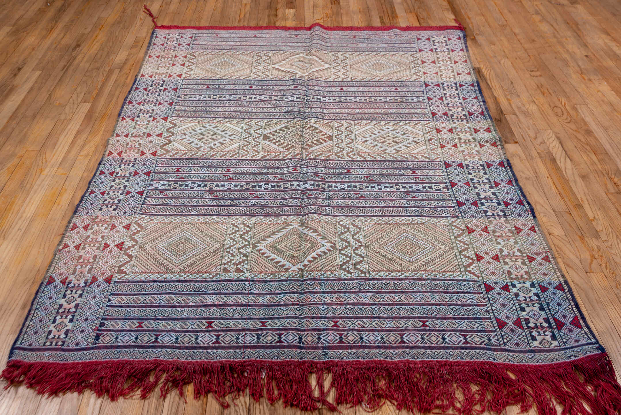 5' x 7' one-of-a-kind handmade vintage Jijim rug. Color palette: blue, gainsboro, gray, light gray, off-white, pink, red