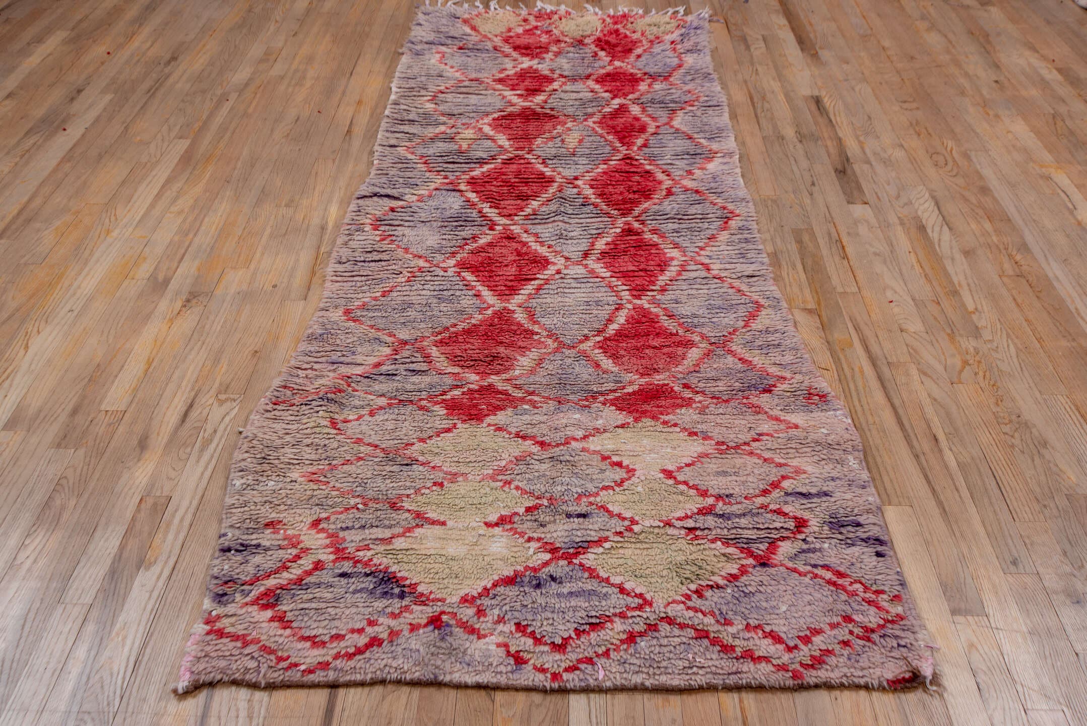 3' x 9' one-of-a-kind handmade vintage Rag Rug runner rug. Color palette: lavender, rose, ivory, blush, lilac, light gray
