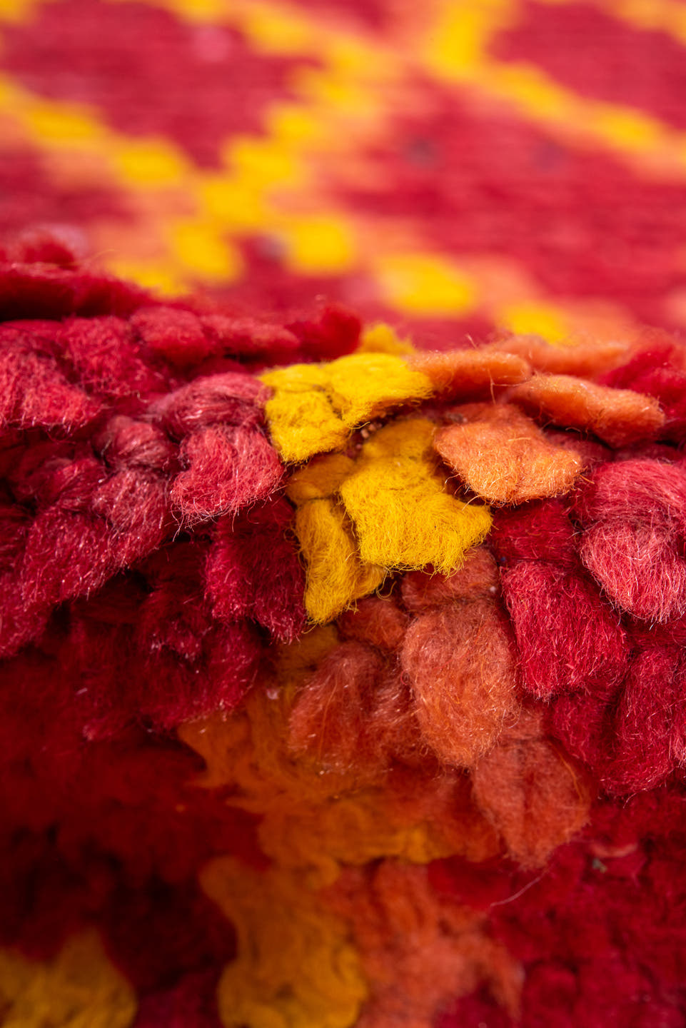 3' x 9' one-of-a-kind handmade vintage Rag Rug runner rug. Color palette: red, coral, gold, terra cotta, rose, terracotta