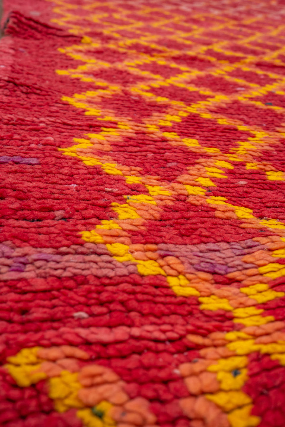 3' x 9' one-of-a-kind handmade vintage Rag Rug runner rug. Color palette: red, coral, gold, terra cotta, rose, terracotta