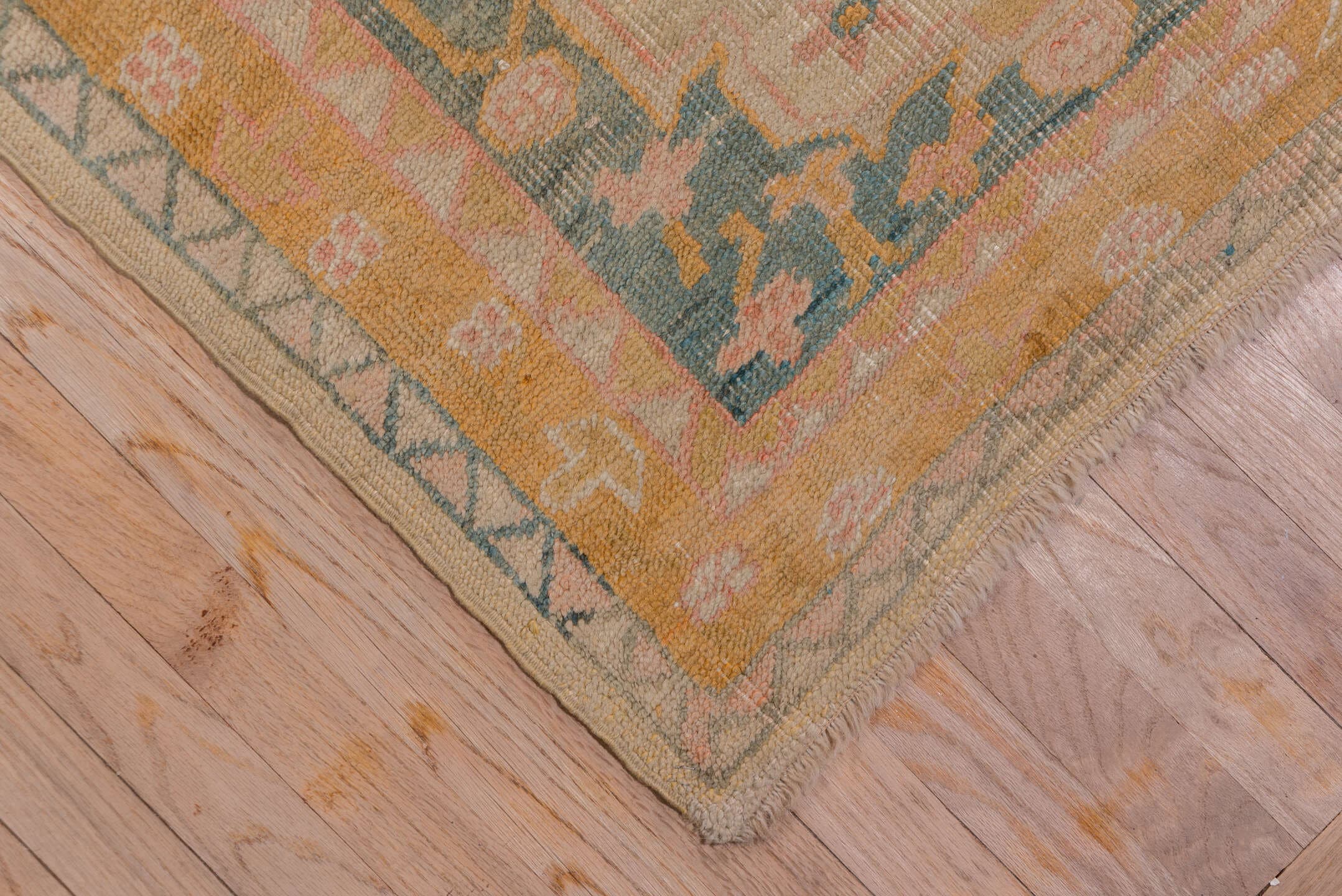 11' x 18' one-of-a-kind handmade antique Oushak oversize rug. Color palette: ivory, apricot, gold, sage, terra cotta, taupe