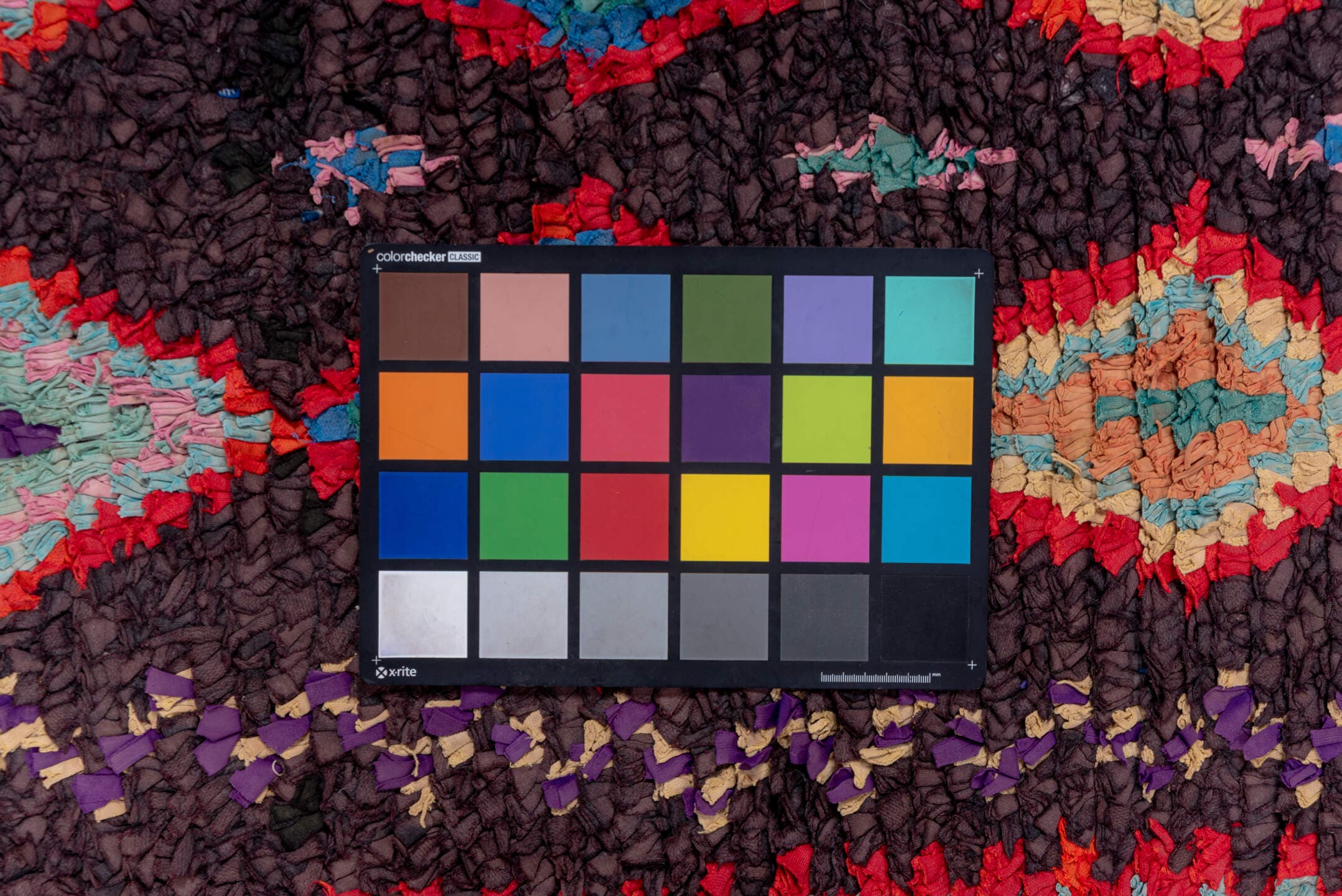 3' x 10' one-of-a-kind handmade vintage Rag Rug runner rug. Color palette: charcoal, crimson, turquoise, lavender, coral