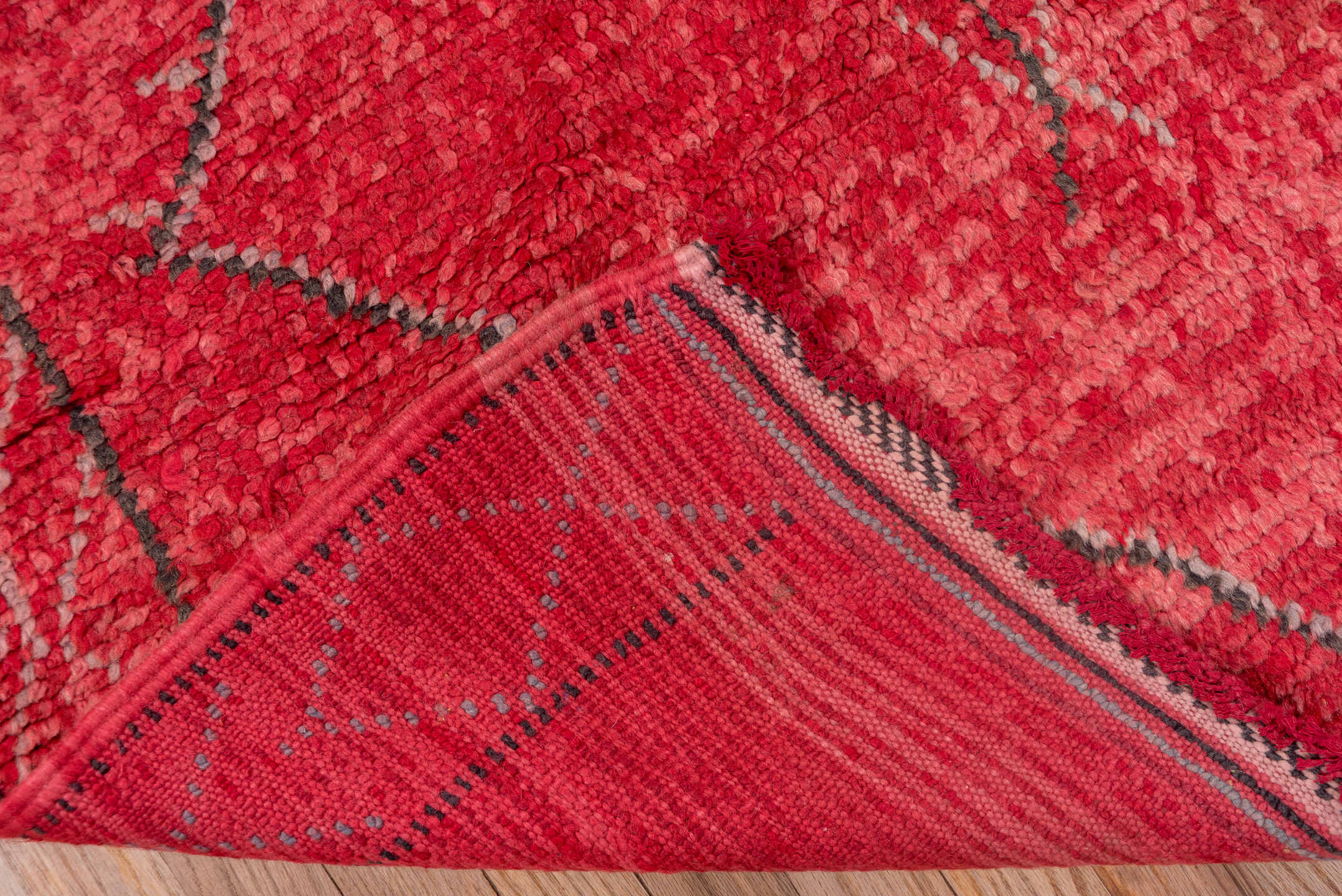 3' x 7' one-of-a-kind handmade vintage Moroccan rug. Color palette: rose, crimson, charcoal, coral, ivory, orange, cobalt