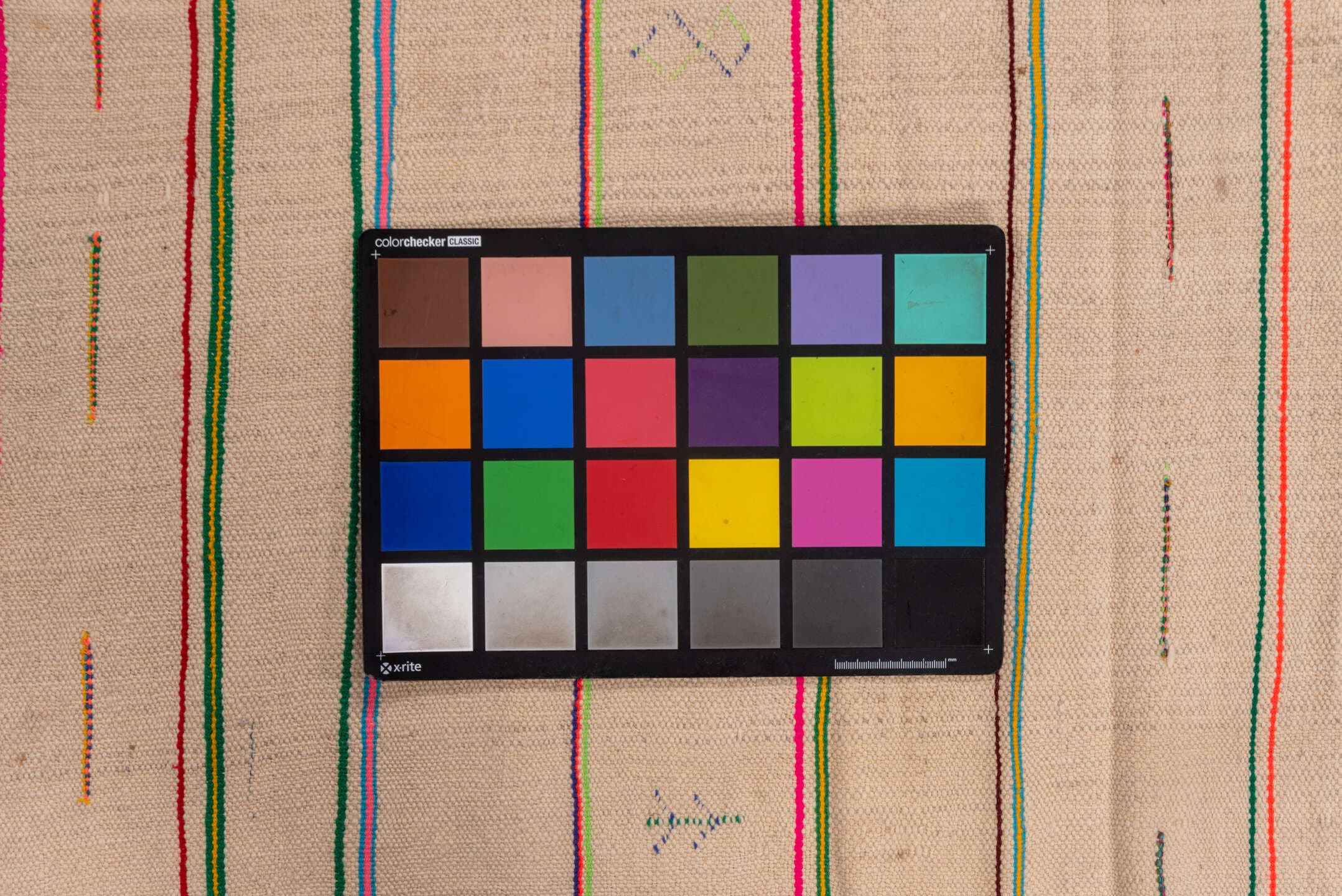 4' x 10' one-of-a-kind handmade vintage Textile runner rug. Color palette: ivory, pink, orange, gold, green, blue, taupe