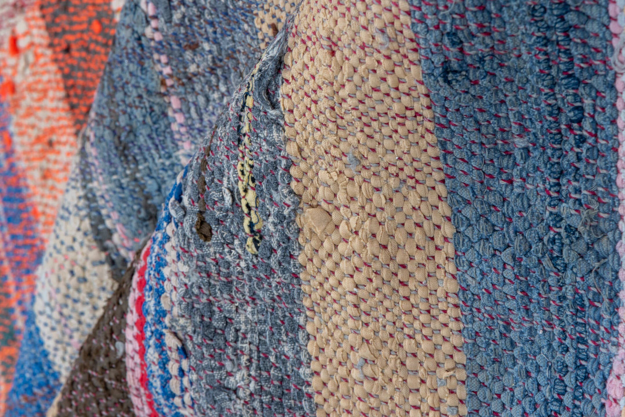 5' x 6' one-of-a-kind handmade vintage Textile rug. Color palette: ivory, indigo, charcoal, rose, coral, slate, yellow