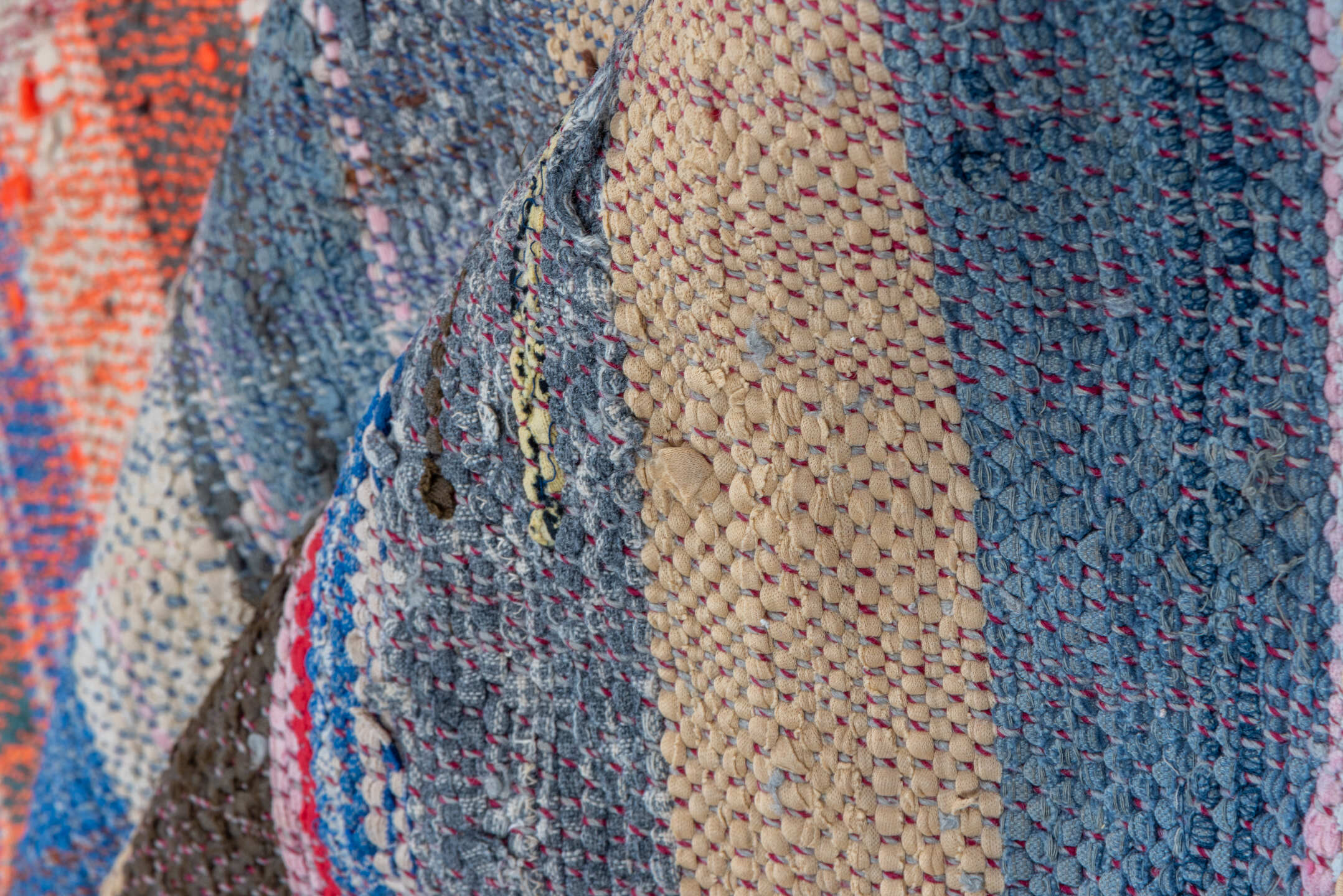 5' x 6' one-of-a-kind handmade vintage Textile rug. Color palette: blue, brown, gray, light gray, off-white, pink, red