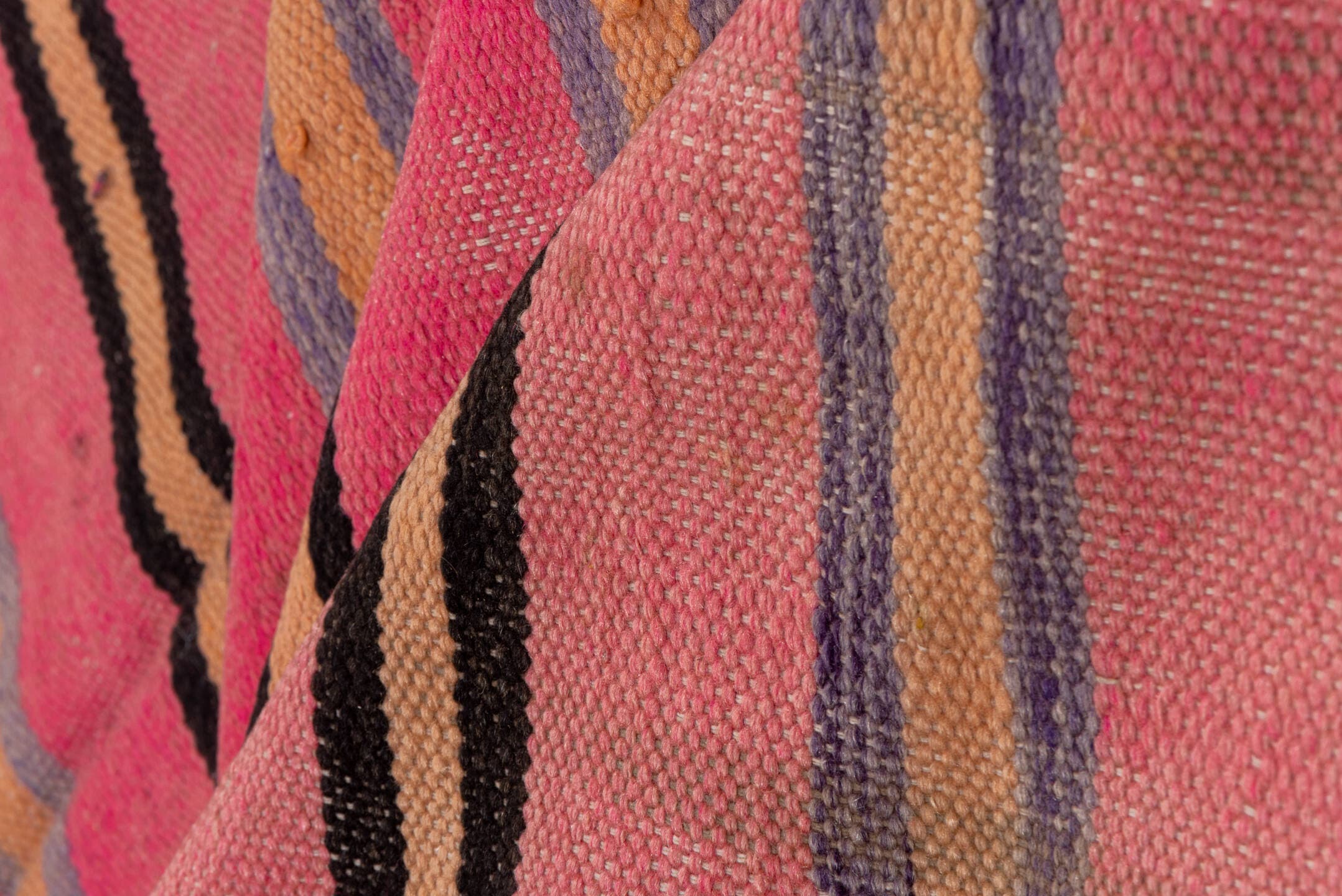 5' x 10' one-of-a-kind handmade vintage Blanket medium size rug. Color palette: pink, charcoal, taupe, muted blue, rose