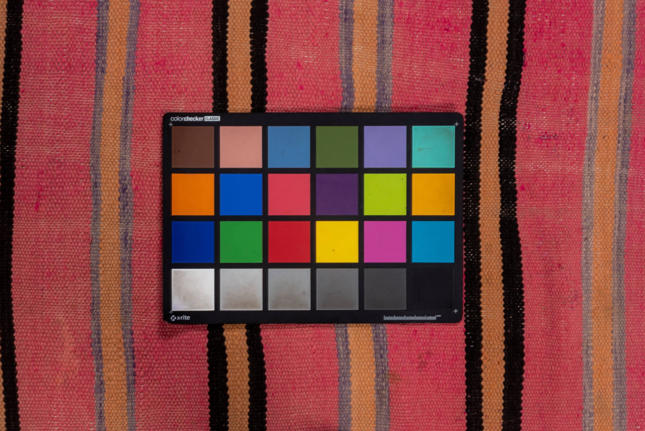 5' x 10' one-of-a-kind handmade vintage Blanket medium size rug. Color palette: brown, pink, red