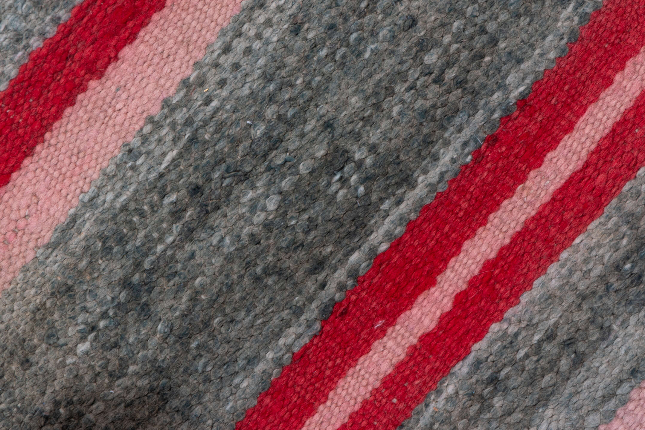 5' x 9' one-of-a-kind handmade vintage Blanket medium size rug. Color palette: brown, gray, light gray, off-white, pink, red