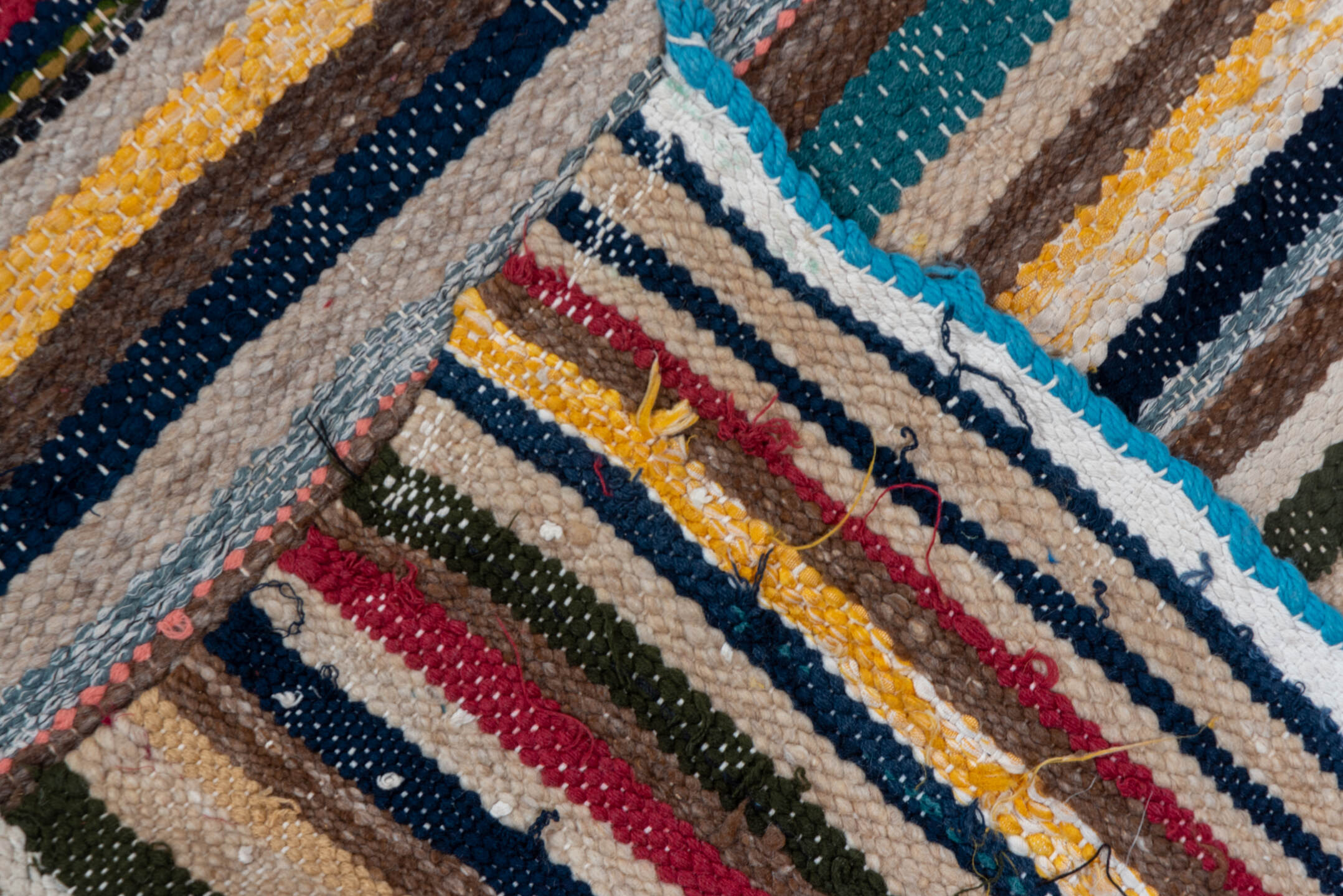 2' x 14' one-of-a-kind handmade vintage Blanket runner rug. Color palette: blue, brown, gray, light gray, off-white, pink