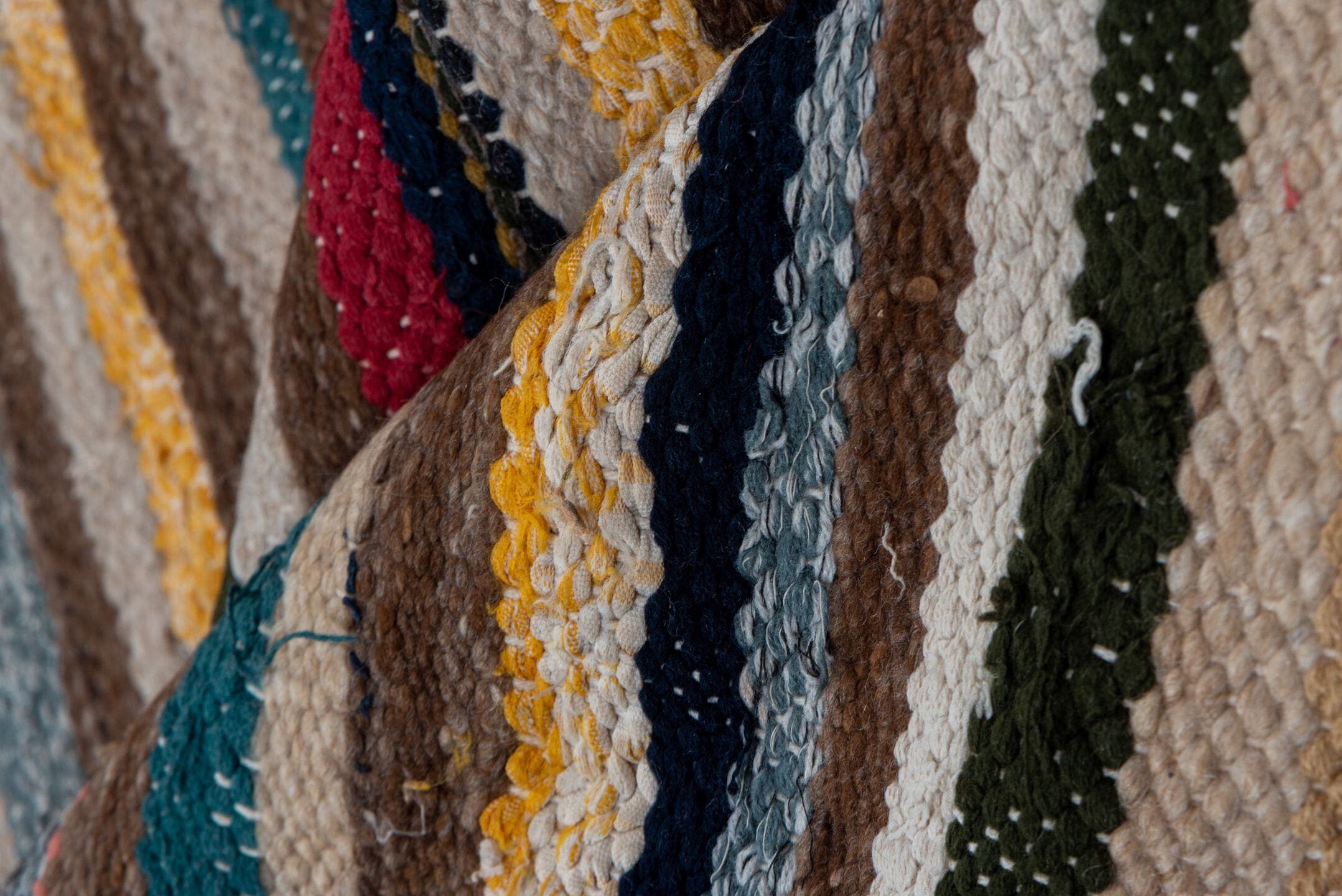 2' x 14' one-of-a-kind handmade vintage Blanket runner rug. Color palette: brown, ivory, indigo, charcoal, crimson, gold