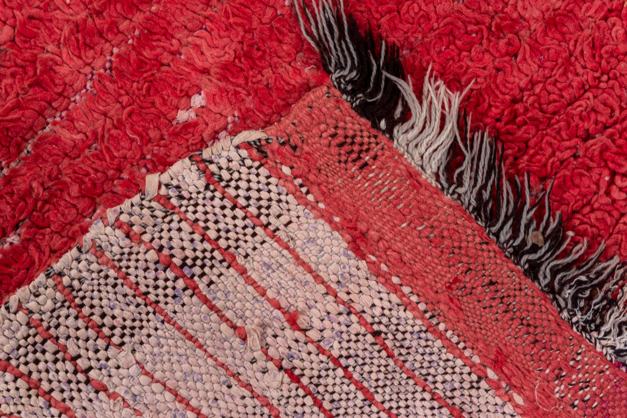 2' x 9' one-of-a-kind handmade vintage Moroccan runner rug. Color palette: red, pink, brown, gray, light gray, off-white