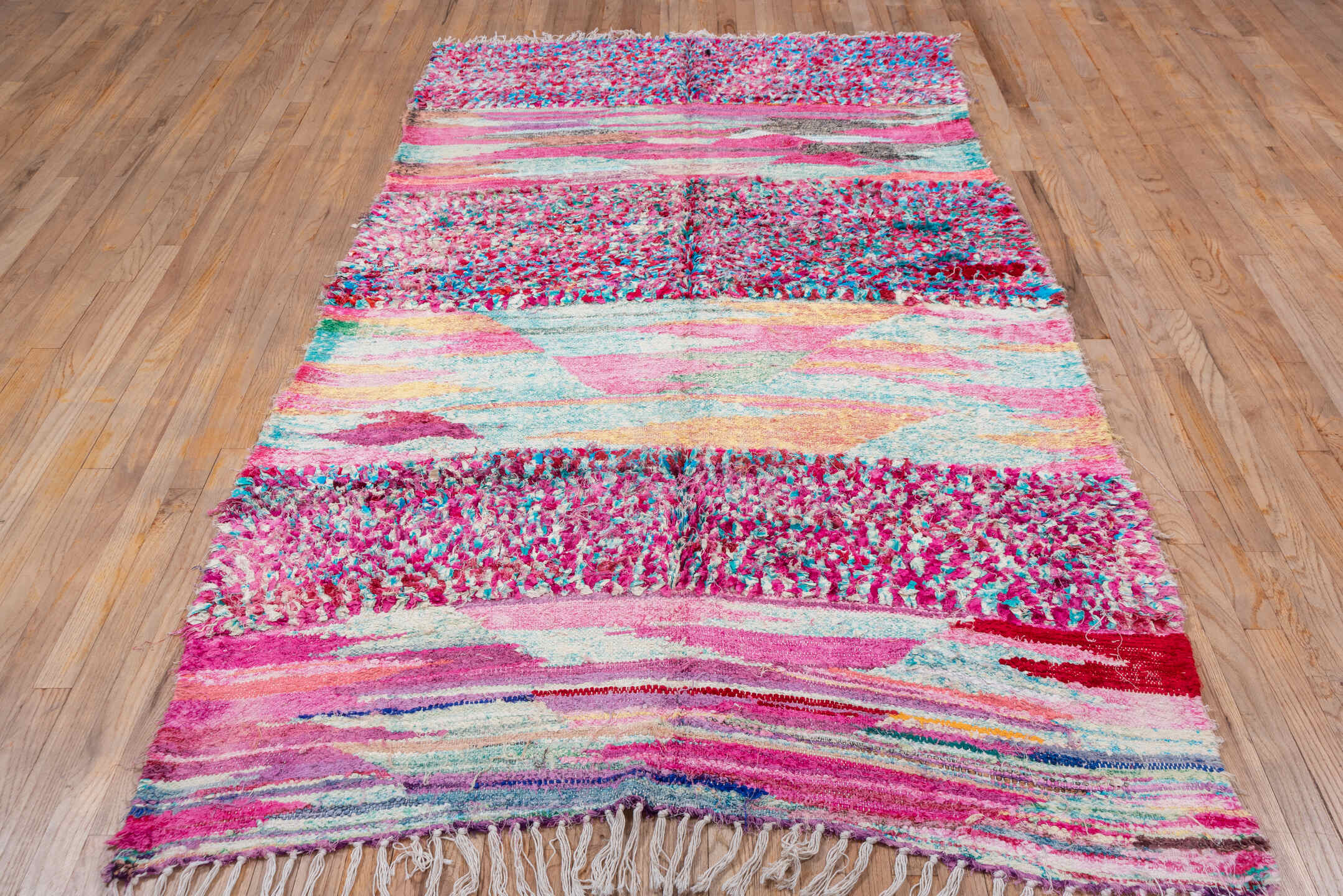 4' x 9' one-of-a-kind handmade vintage Rag Rug rug. Color palette: pink, turquoise, ivory, burgundy, rose, taupe, gold, teal