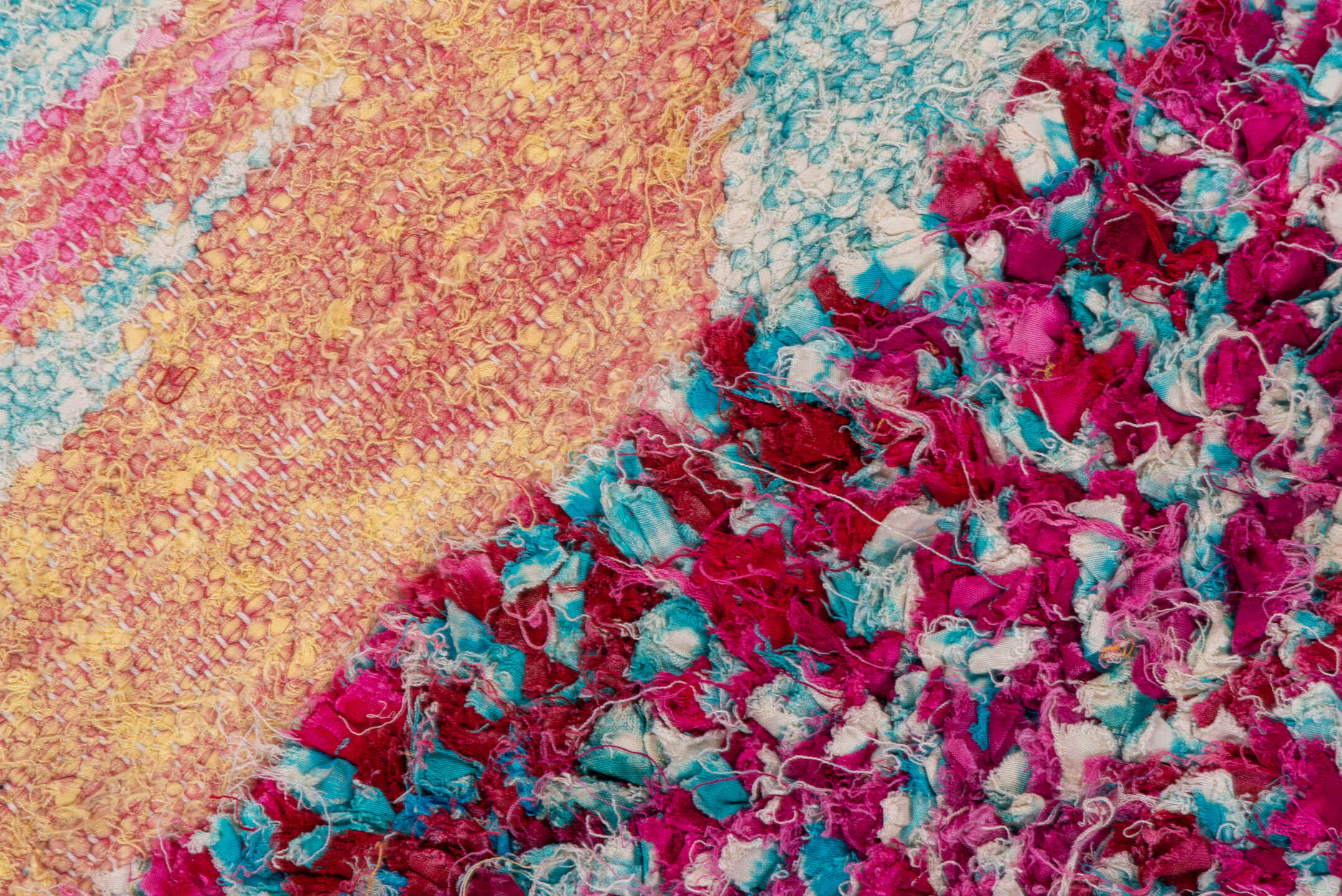 4' x 9' one-of-a-kind handmade vintage Rag Rug rug. Color palette: pink, turquoise, ivory, burgundy, rose, taupe, gold, teal