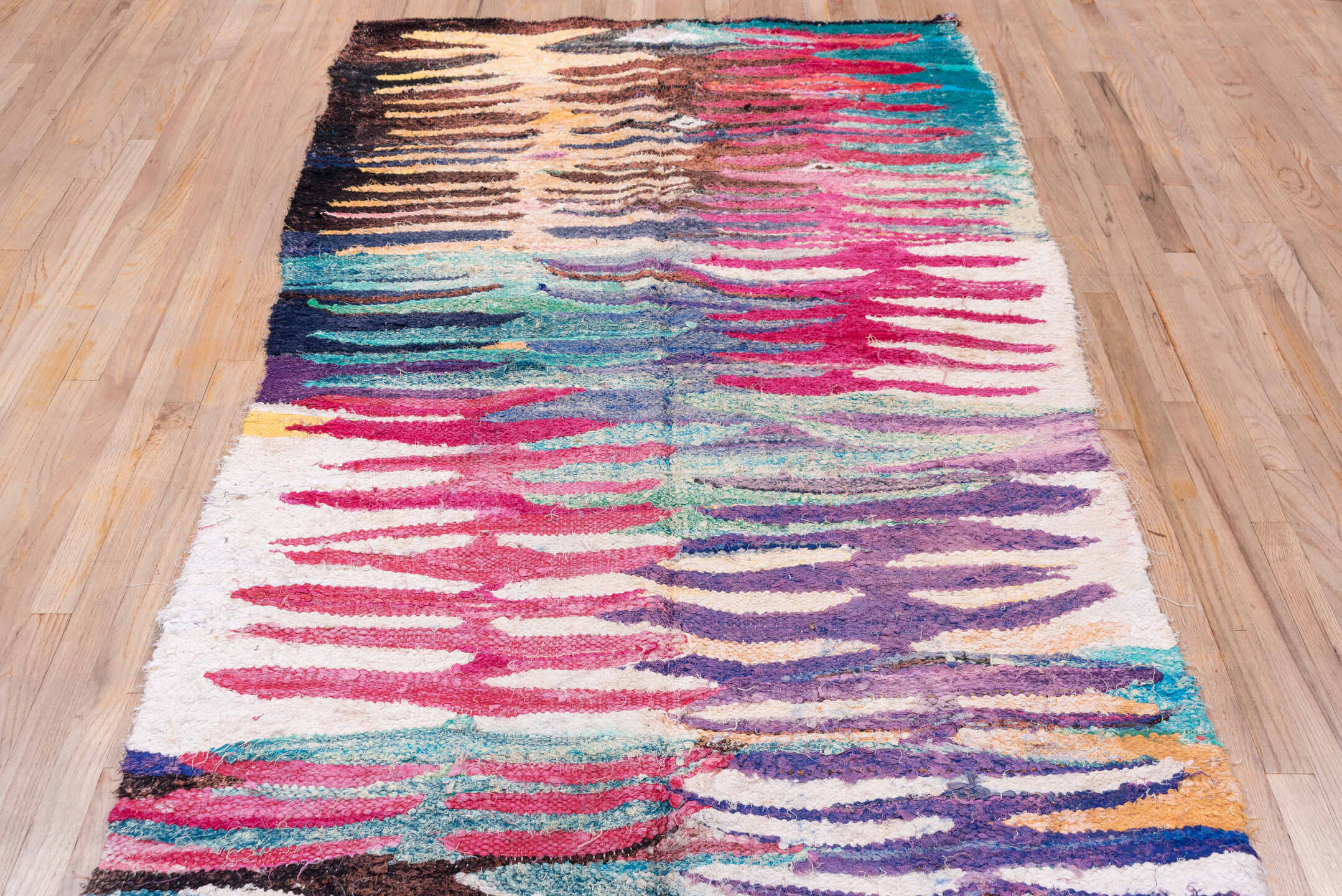 4' x 8' one-of-a-kind handmade vintage Flatweave rug. Color palette: ivory, magenta, brown, teal, violet, turquoise, camel
