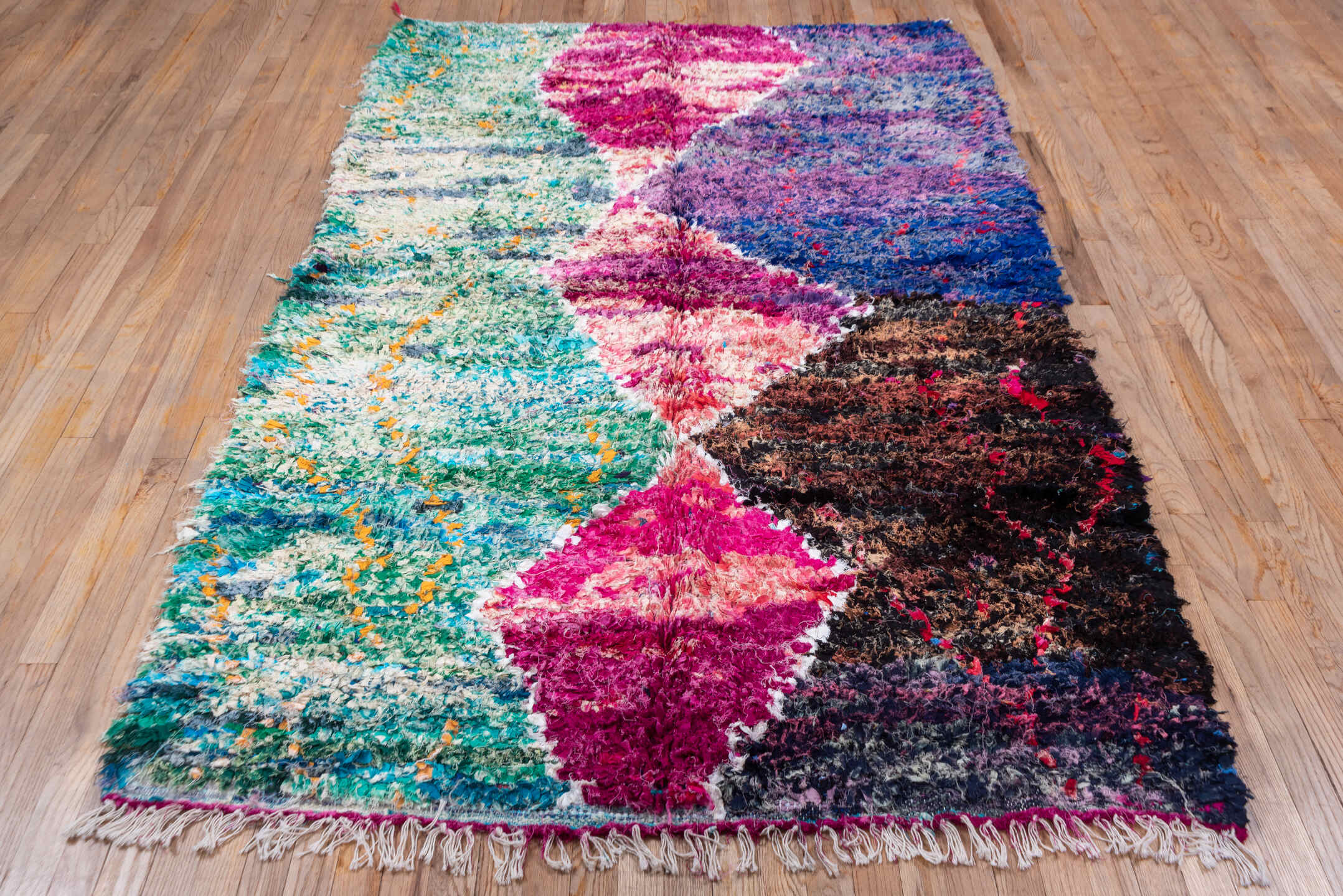 5' x 8' one-of-a-kind handmade vintage Rag Rug medium size rug. Color palette: turquoise, cobalt, fuchsia, violet, ivory