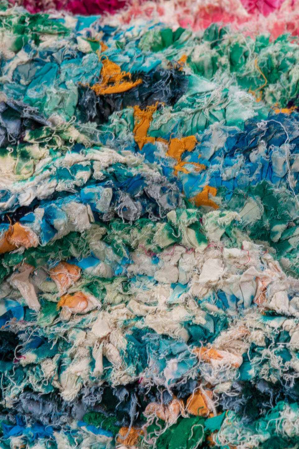 5' x 8' one-of-a-kind handmade vintage Rag Rug medium size rug. Color palette: turquoise, cobalt, fuchsia, violet, ivory
