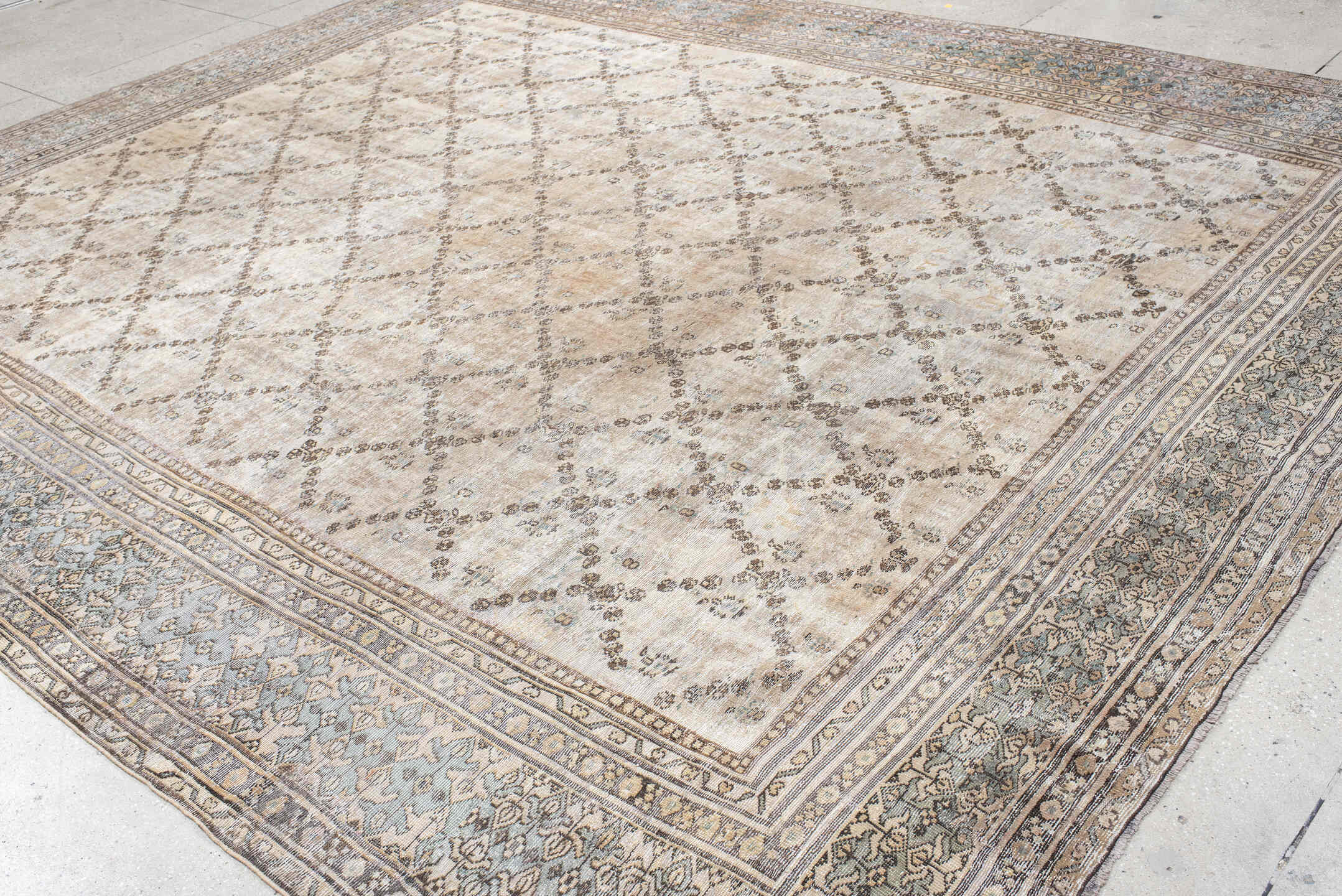 11' x 14' one-of-a-kind handmade vintage Sultanabad oversize rug. Color palette: ivory, taupe, pale blue, beige, brown, gray