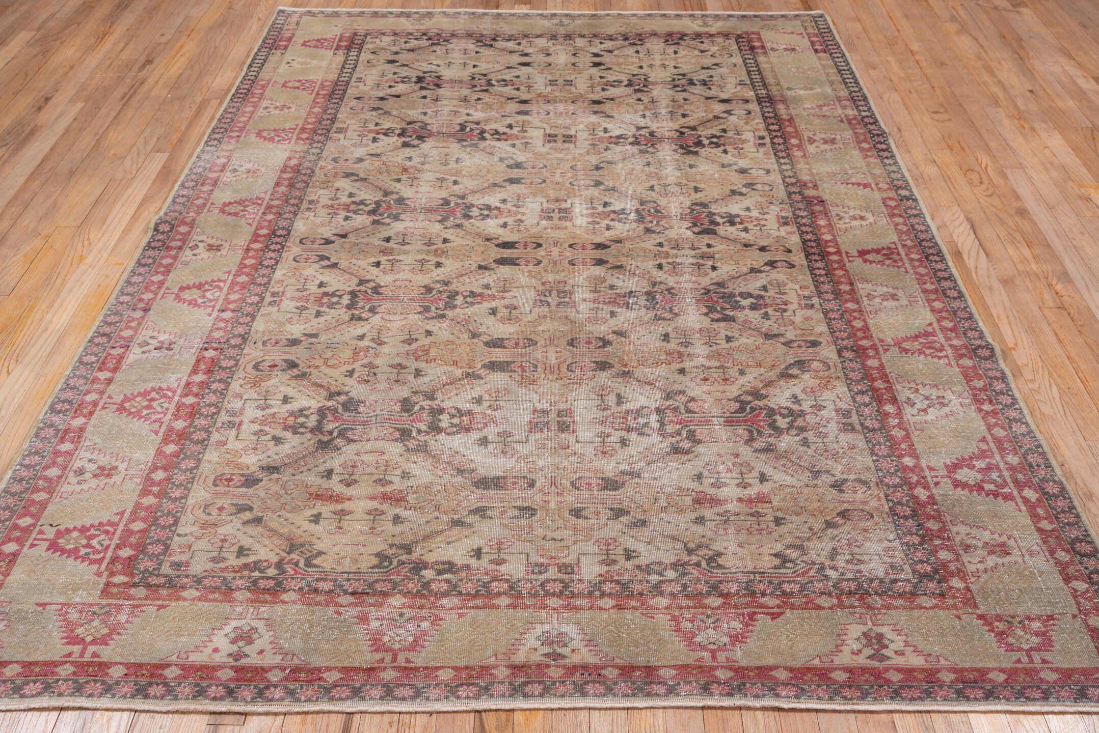 6' x 9' one-of-a-kind handmade antique Sivas medium size rug. Color palette: ivory, taupe, rose, charcoal, terra cotta