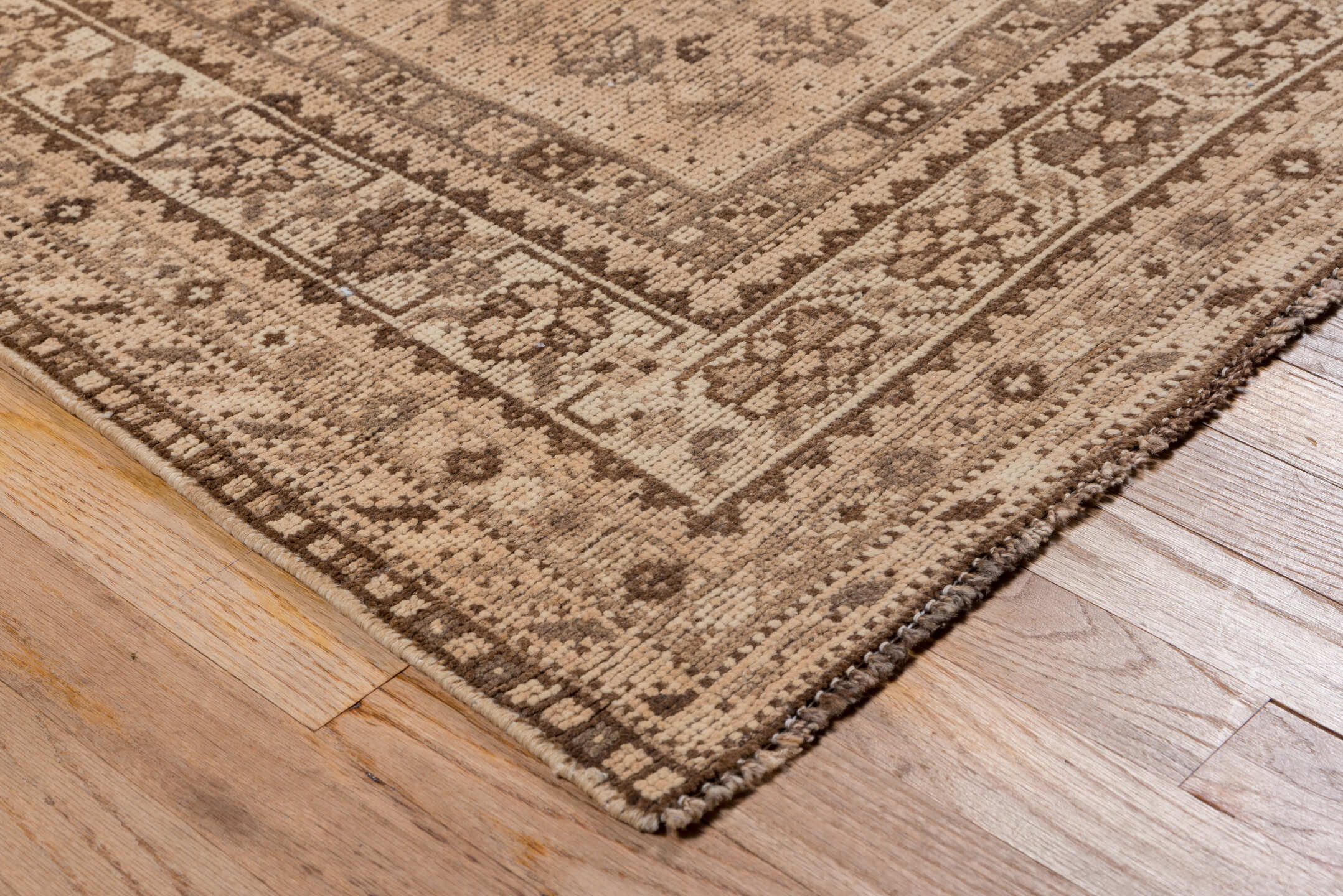 5' x 6' one-of-a-kind handmade antique Shiraz rug. Color palette: camel, taupe, brown, beige, ivory, gray