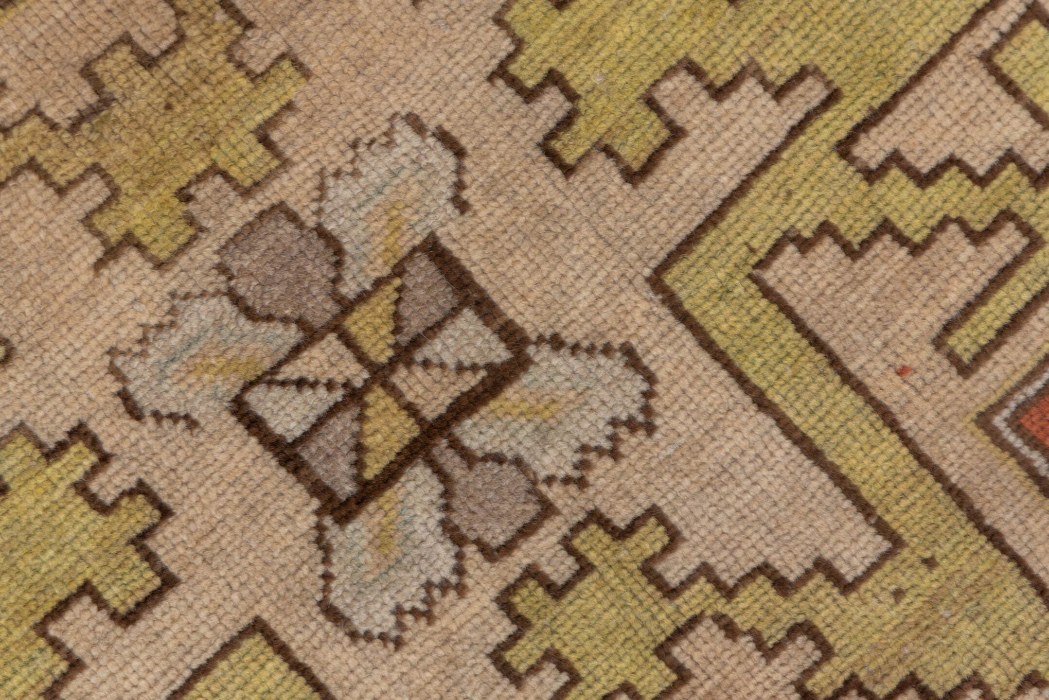 3' x 6' one-of-a-kind handmade antique Caucasian small size rug. Color palette: ivory, rust, taupe, gold, brown, camel