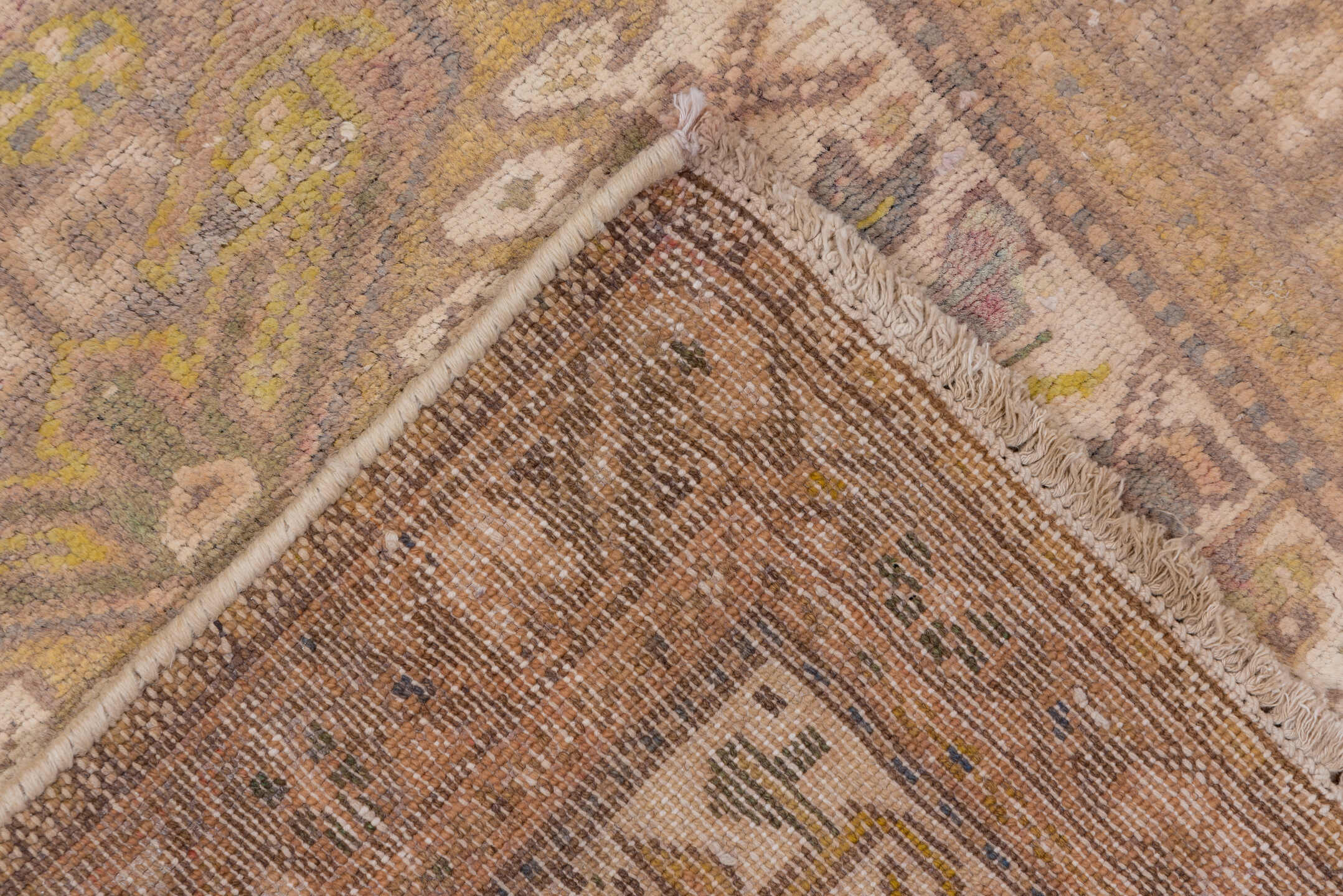 2' x 10' one-of-a-kind handmade vintage Karaje runner rug. Color palette: brown, gray, light gray, off-white, pink, snow