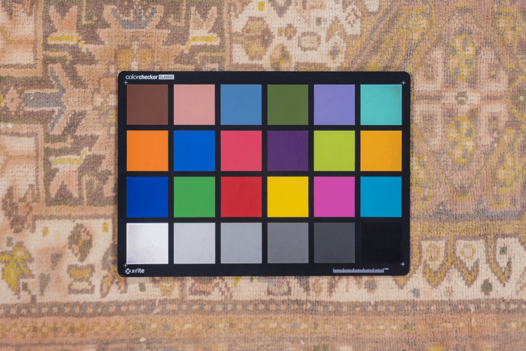 2' x 10' one-of-a-kind handmade vintage Karaje runner rug. Color palette: brown, gray, light gray, off-white, pink, snow