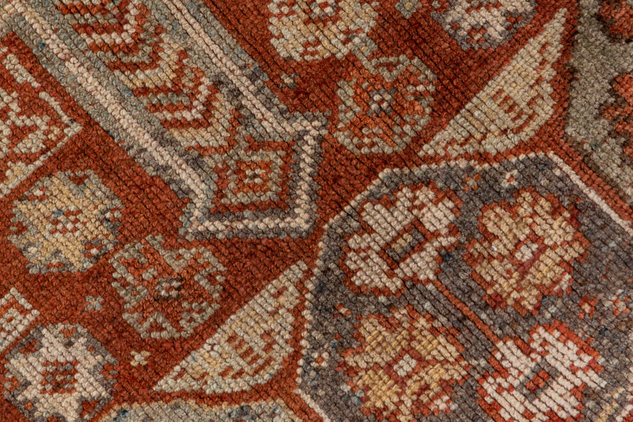 4' x 7' one-of-a-kind handmade antique Kurd rug. Color palette: rust, ivory, terra cotta, brown, taupe, charcoal, terracotta