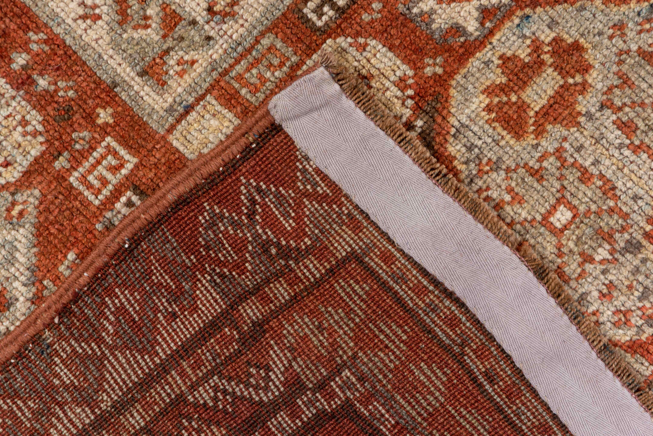 4' x 7' one-of-a-kind handmade antique Kurd rug. Color palette: rust, ivory, terra cotta, brown, taupe, charcoal, terracotta