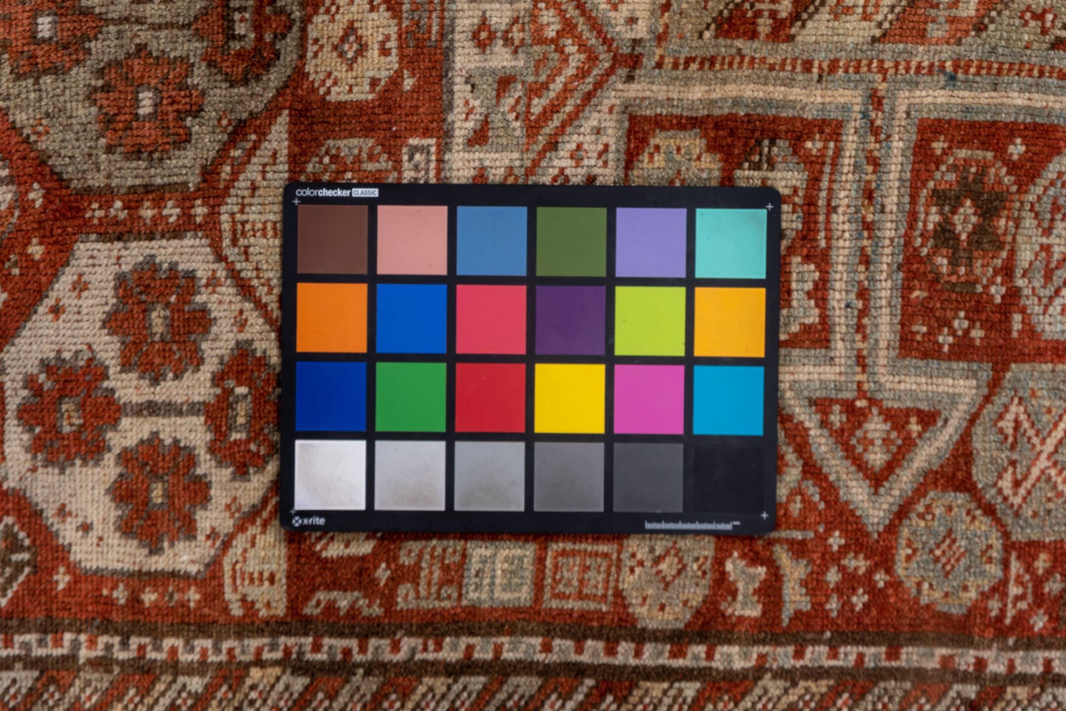 4' x 7' one-of-a-kind handmade antique Kurd rug. Color palette: rust, ivory, terra cotta, brown, taupe, charcoal, terracotta
