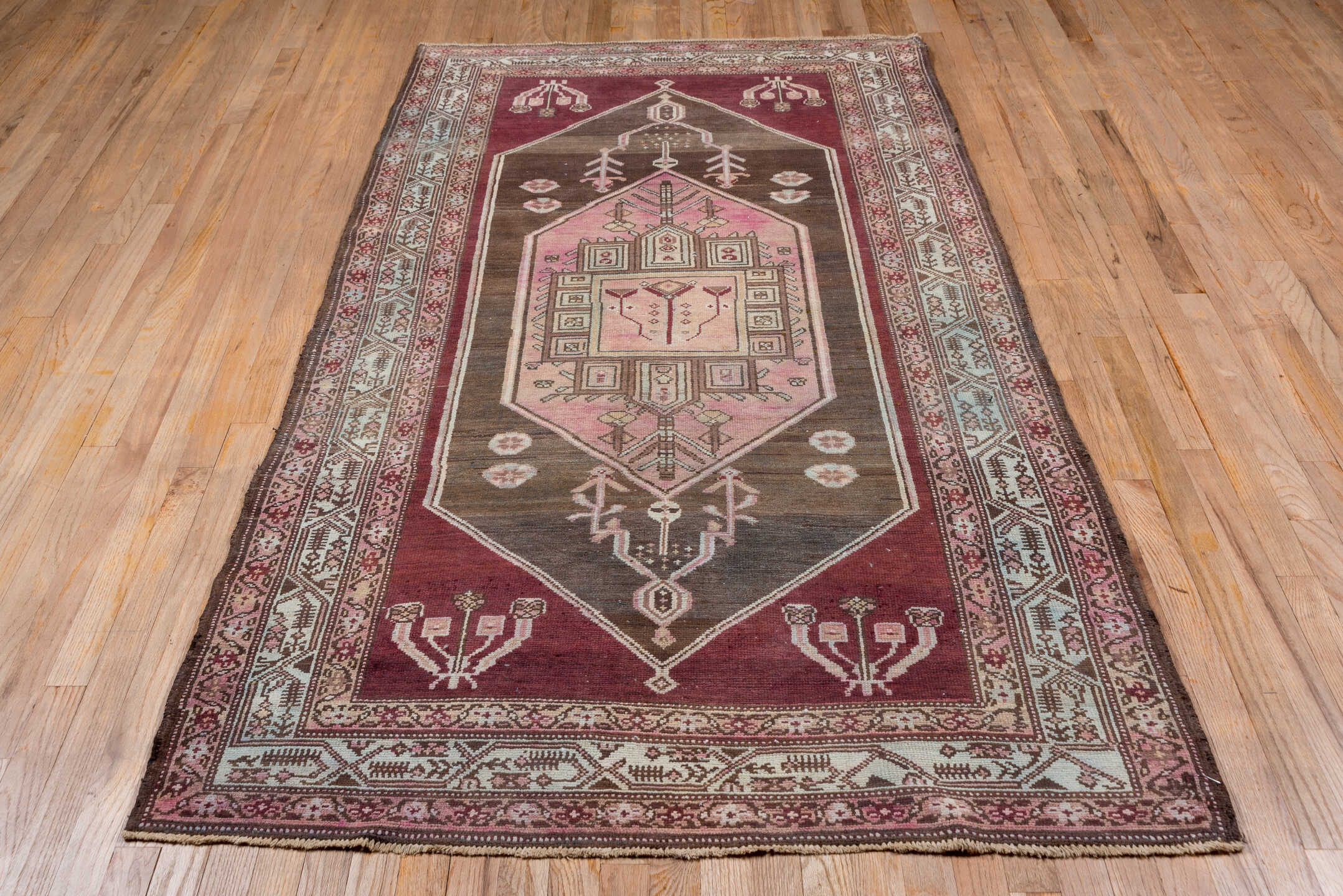4' x 7' one-of-a-kind handmade antique Malayer rug. Color palette: rose, brown, ivory, dusty pink, taupe, burgundy, charcoal
