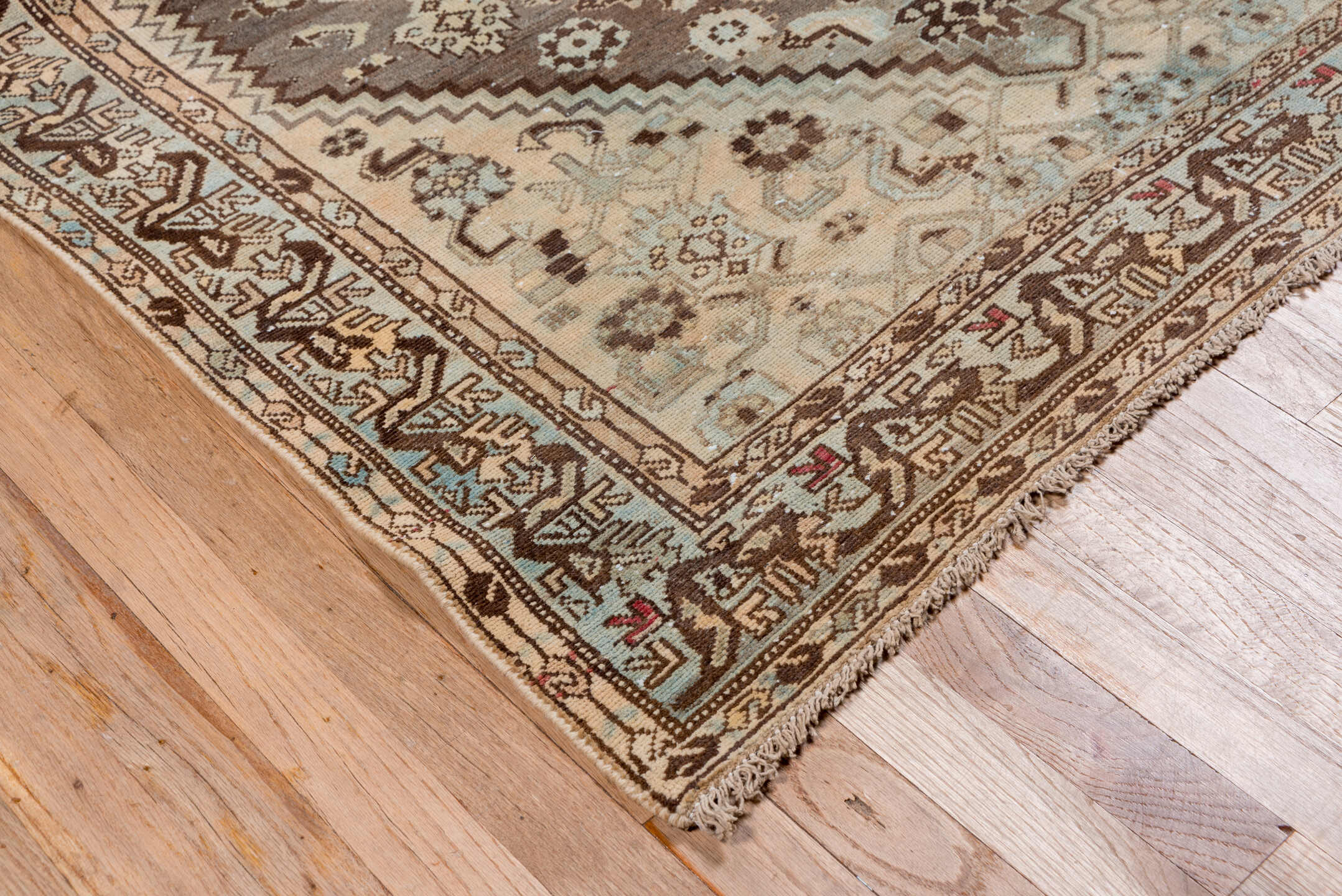 4' x 6' one-of-a-kind handmade antique Shiraz small size rug. Color palette: ivory, taupe, brown, pale blue, camel, charcoal