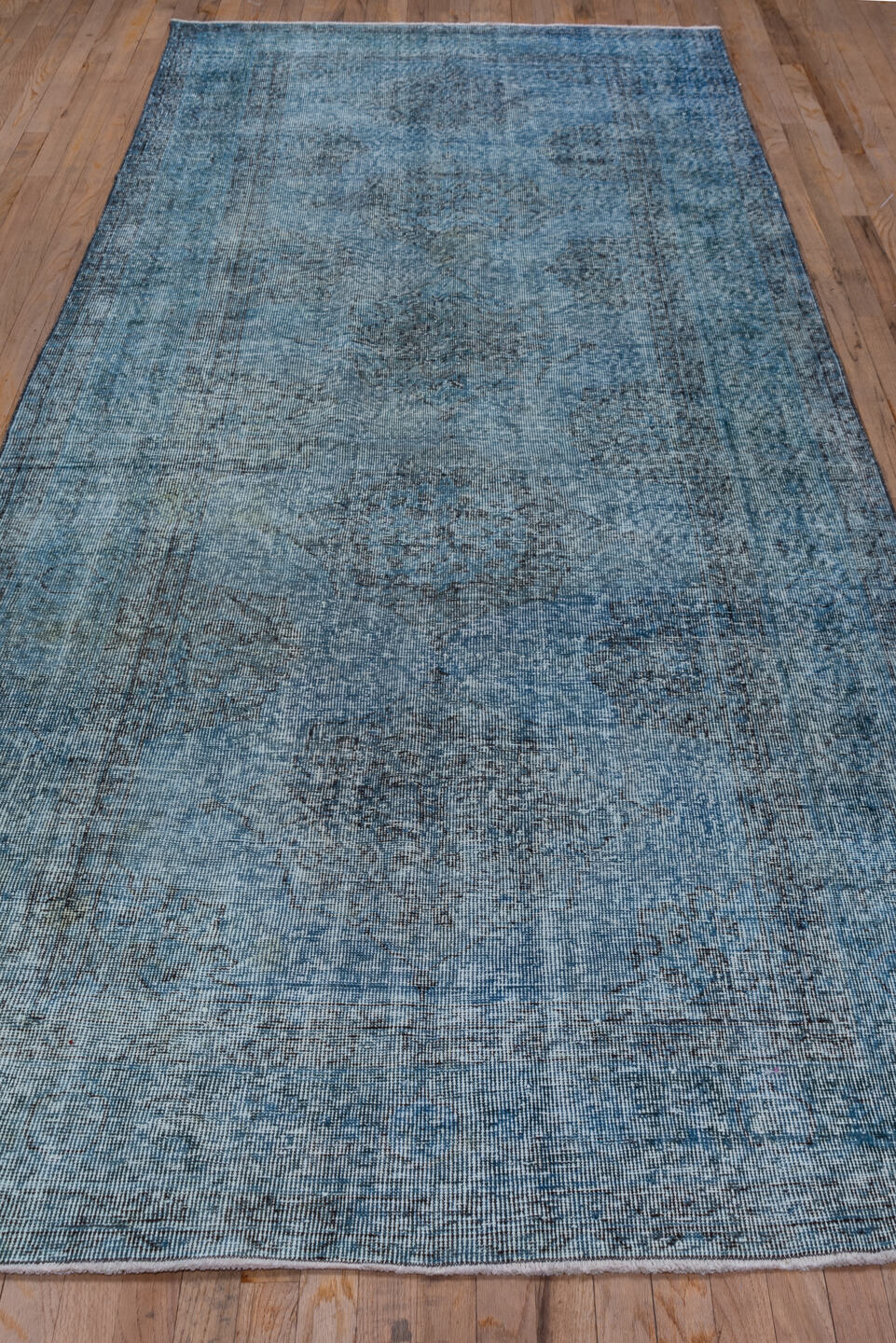 4' x 12' one-of-a-kind handmade vintage Overdyed runner rug. Color palette: arapawa, black, blue, gray, light blue