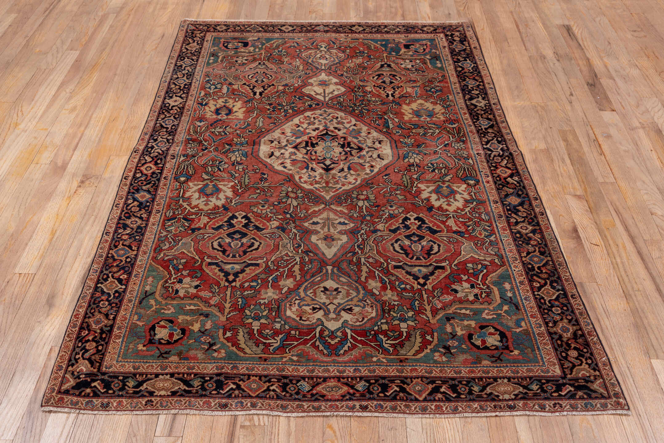 4' x 6' one-of-a-kind handmade antique Far.Sarouk small size rug. Color palette: rust, ivory, navy, soft blue, taupe, camel