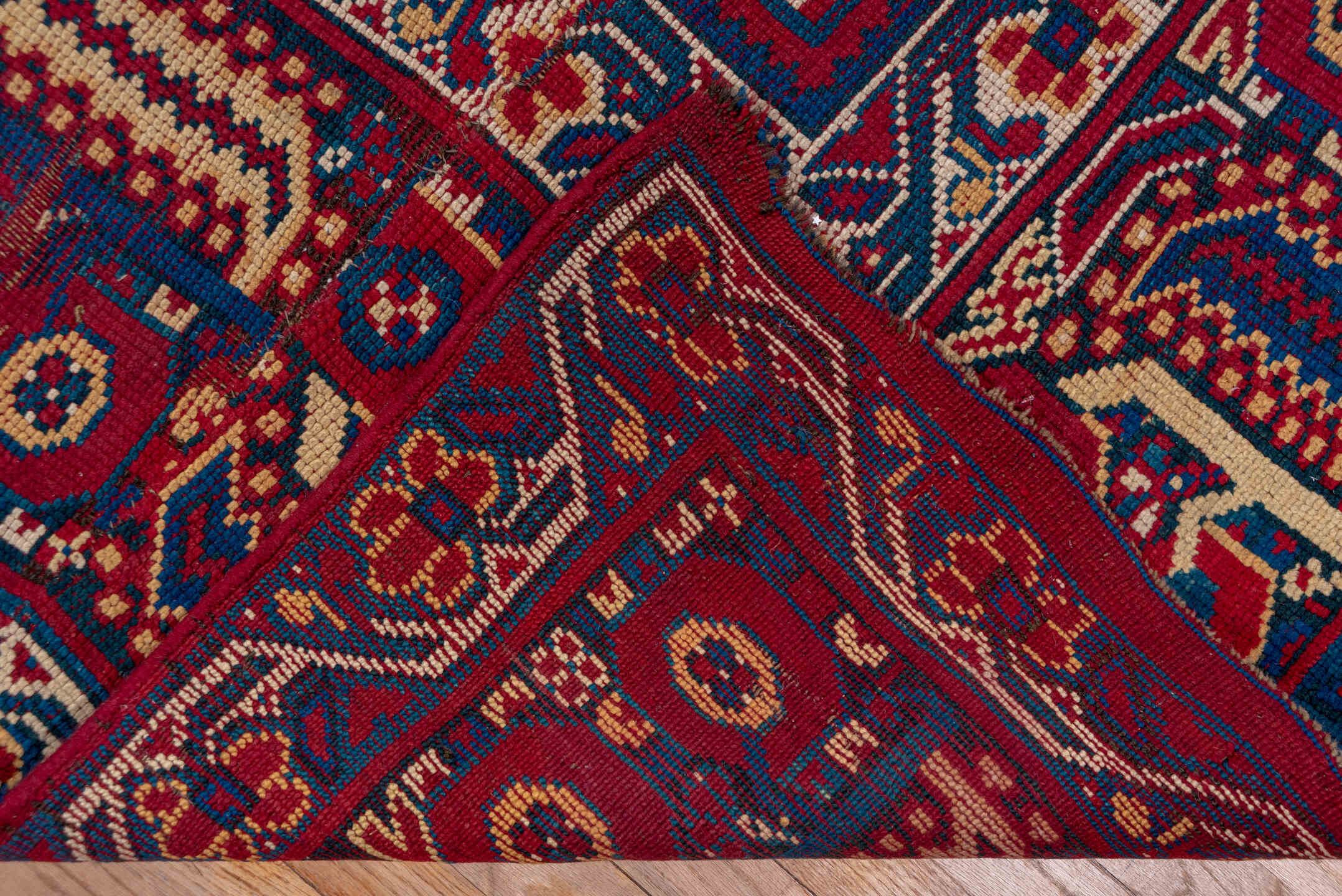 6' x 18' one-of-a-kind handmade antique Moroccan rug. Color palette: crimson, indigo, ivory, navy, rust, saffron, camel, red