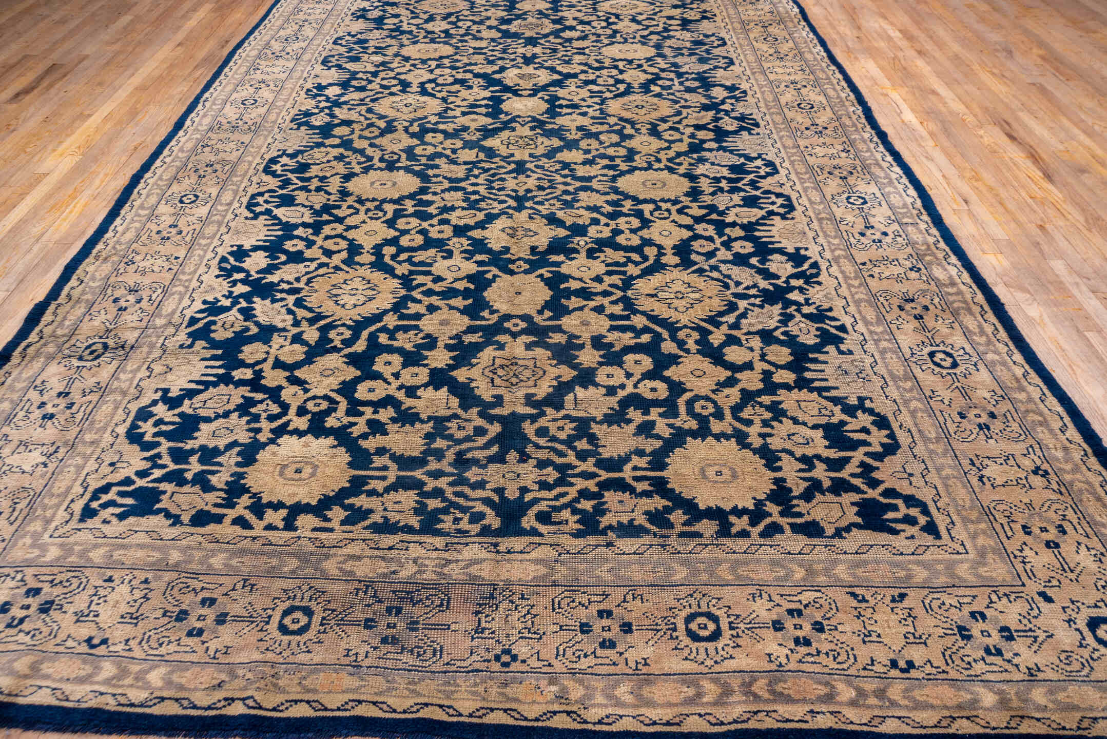 9' x 17' one-of-a-kind handmade antique Oushak rug. Color palette: navy, ivory, beige, taupe, blue, gray