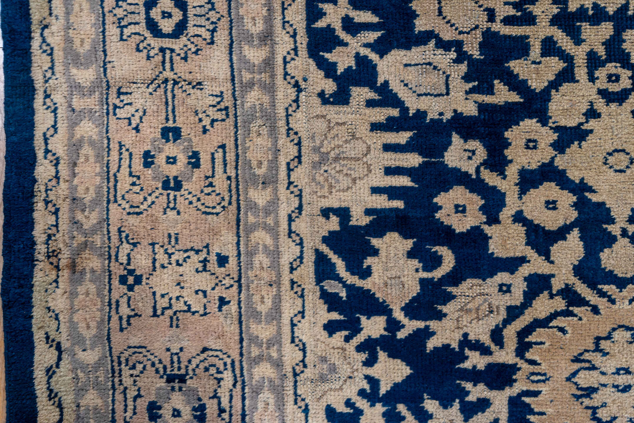 9' x 17' one-of-a-kind handmade antique Oushak rug. Color palette: navy, ivory, beige, taupe, blue, gray
