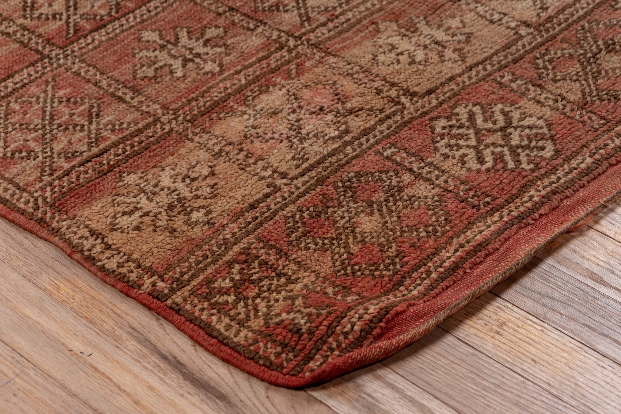 4' x 7' one-of-a-kind handmade vintage Moroccan rug. Color palette: terra cotta, camel, taupe, rust, brown, ivory