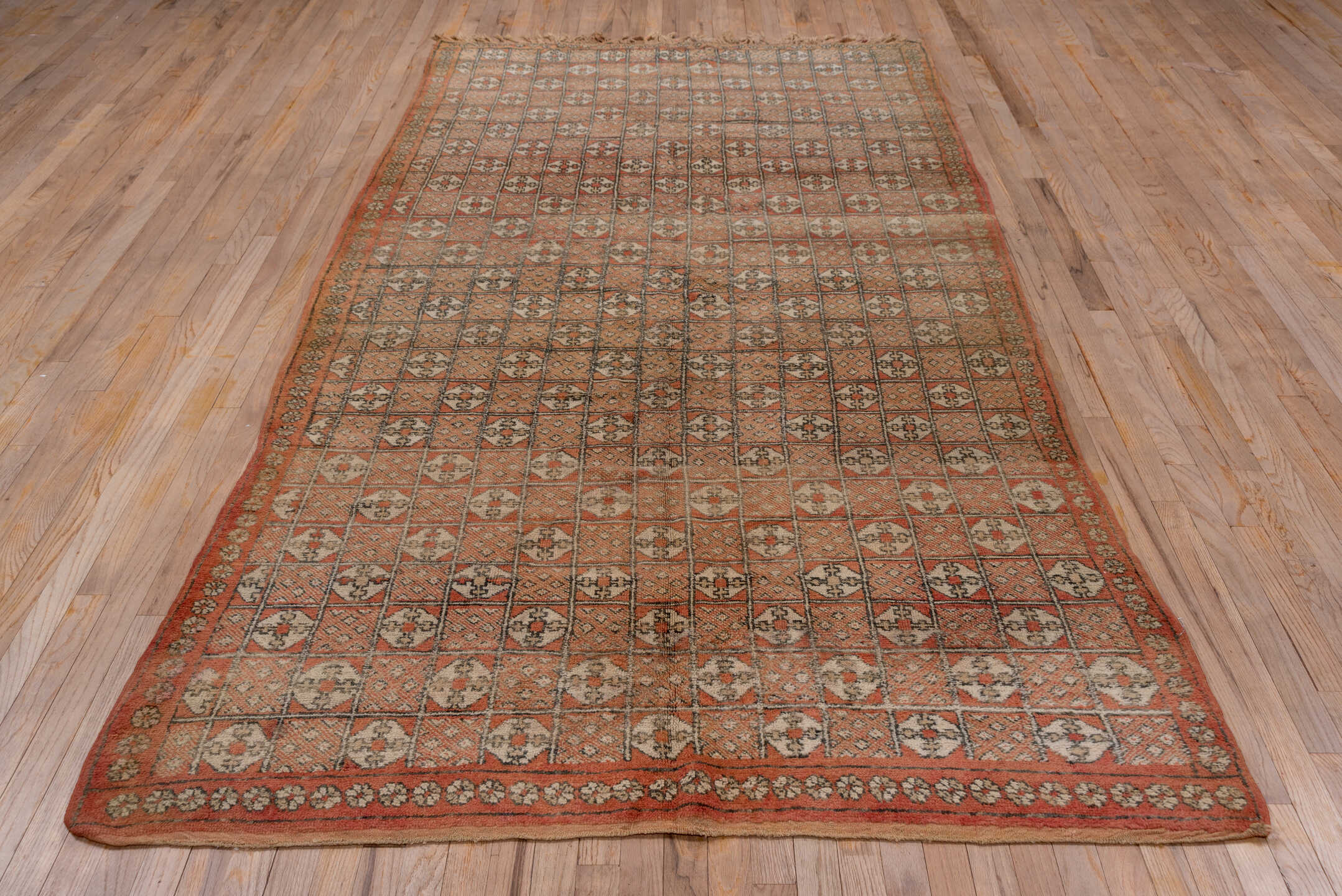 5' x 10' one-of-a-kind handmade vintage Moroccan medium size rug. Color palette: terra cotta, ivory, charcoal, camel, taupe